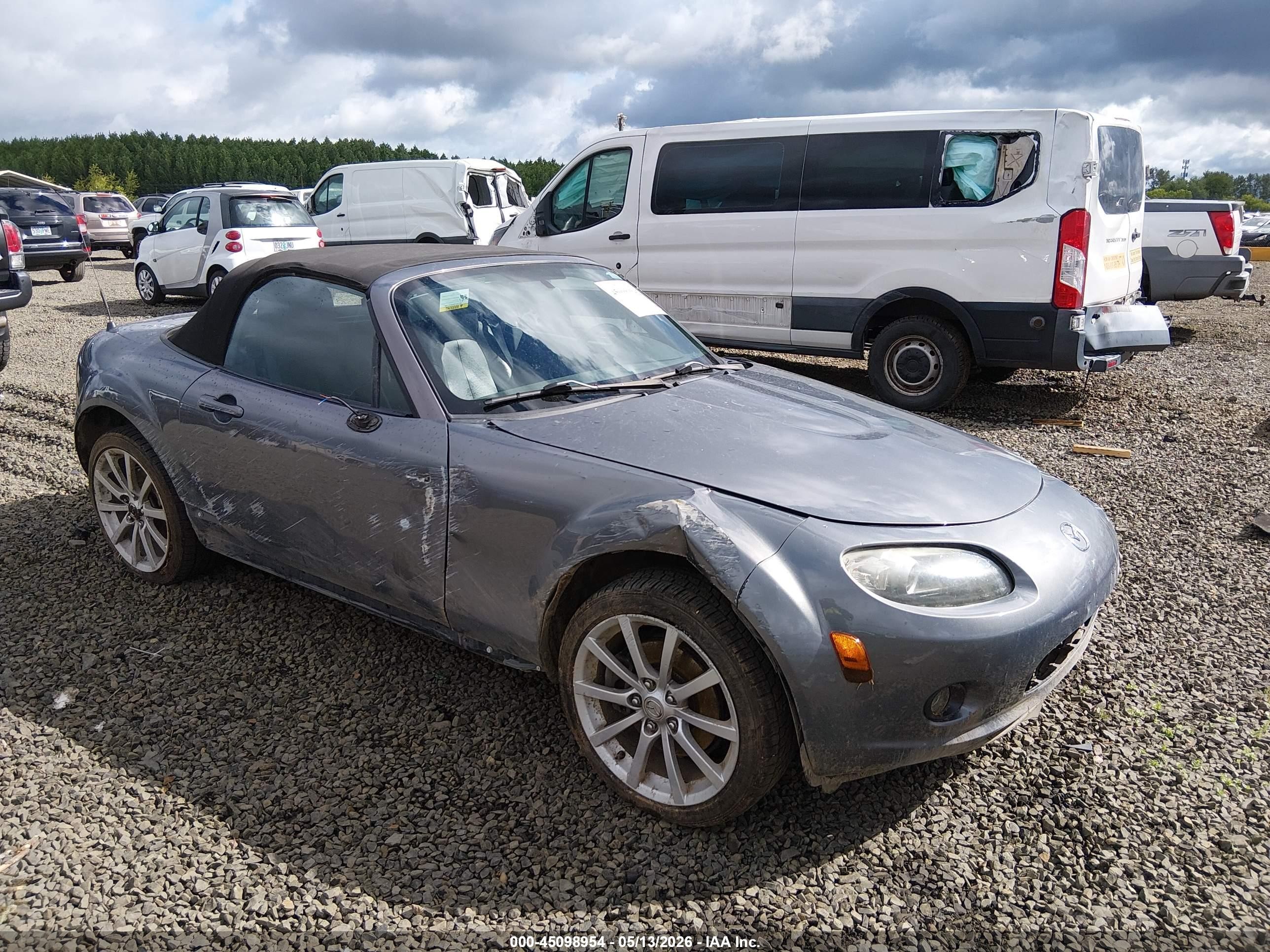 2006 Mazda MX-5 Miata Touring, VIN JM1NC25FX60105188 — Side