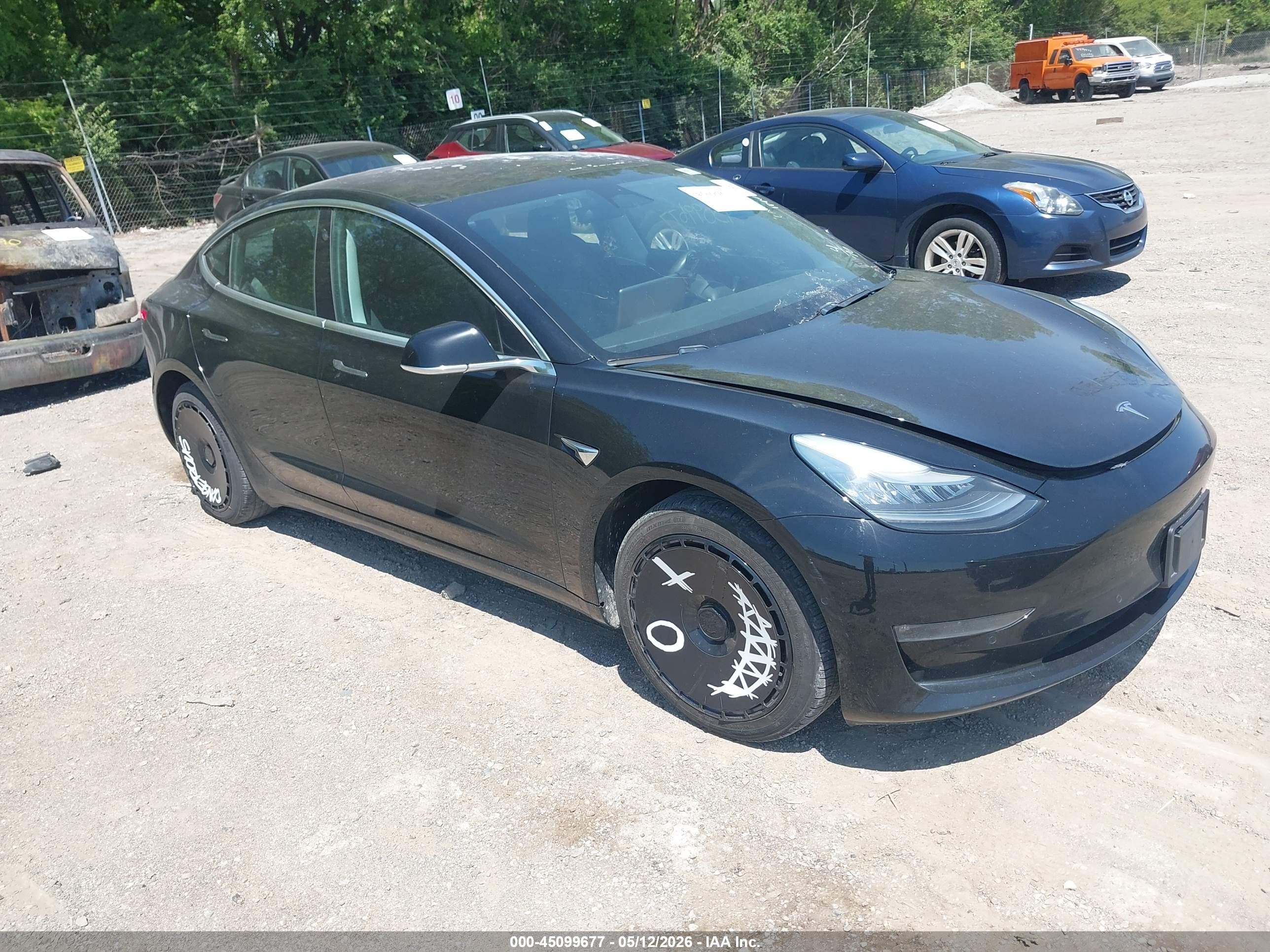 2019 Tesla Model 3 Mid Range, VIN 5YJ3E1EA8KF304493 — Burn