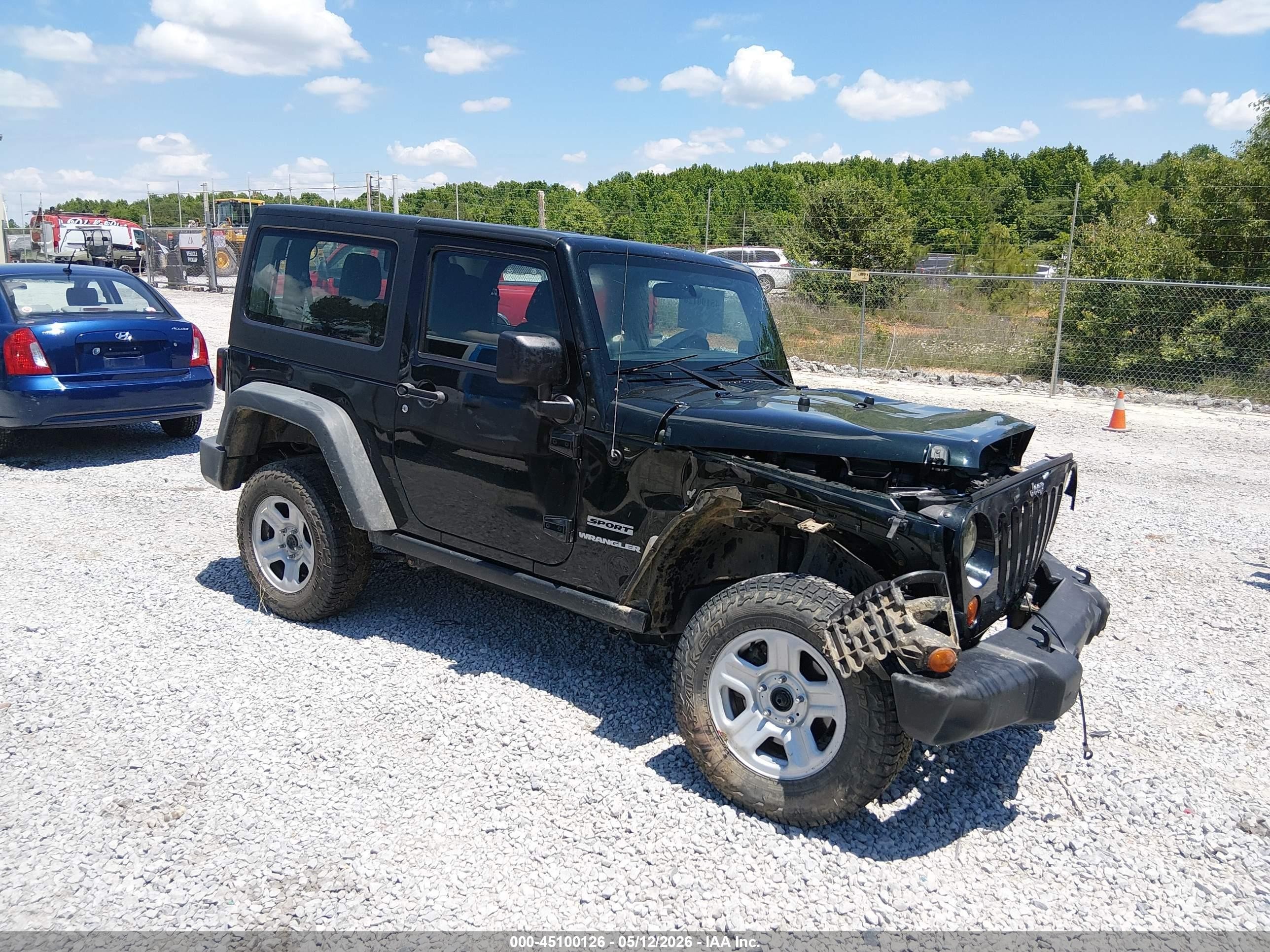 2012 Jeep Wrangler Sport, VIN 1C4AJWAG5CL233035 — Front end