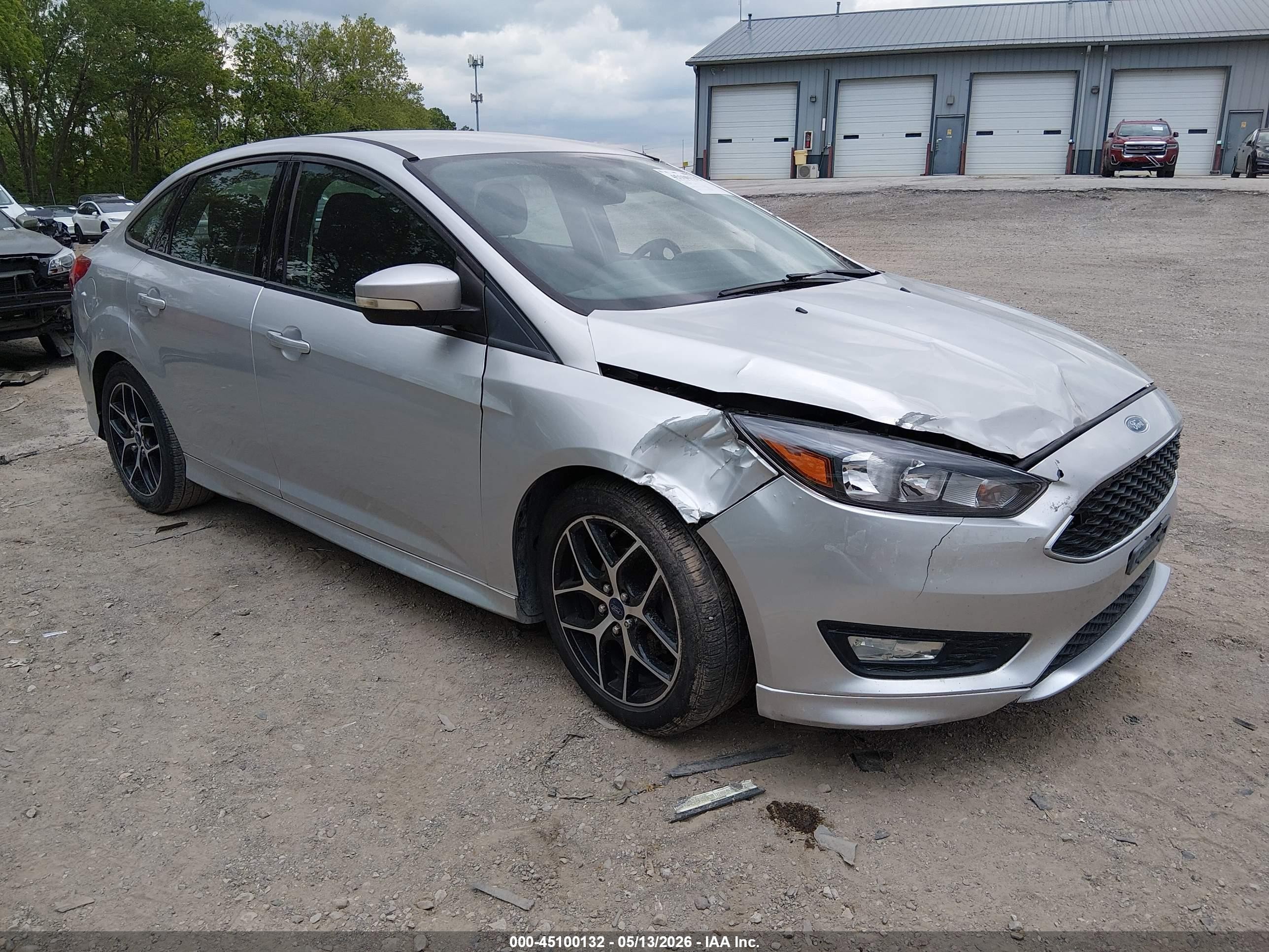 2015 Ford Focus SE, VIN 1FADP3F27FL338841 — Side
