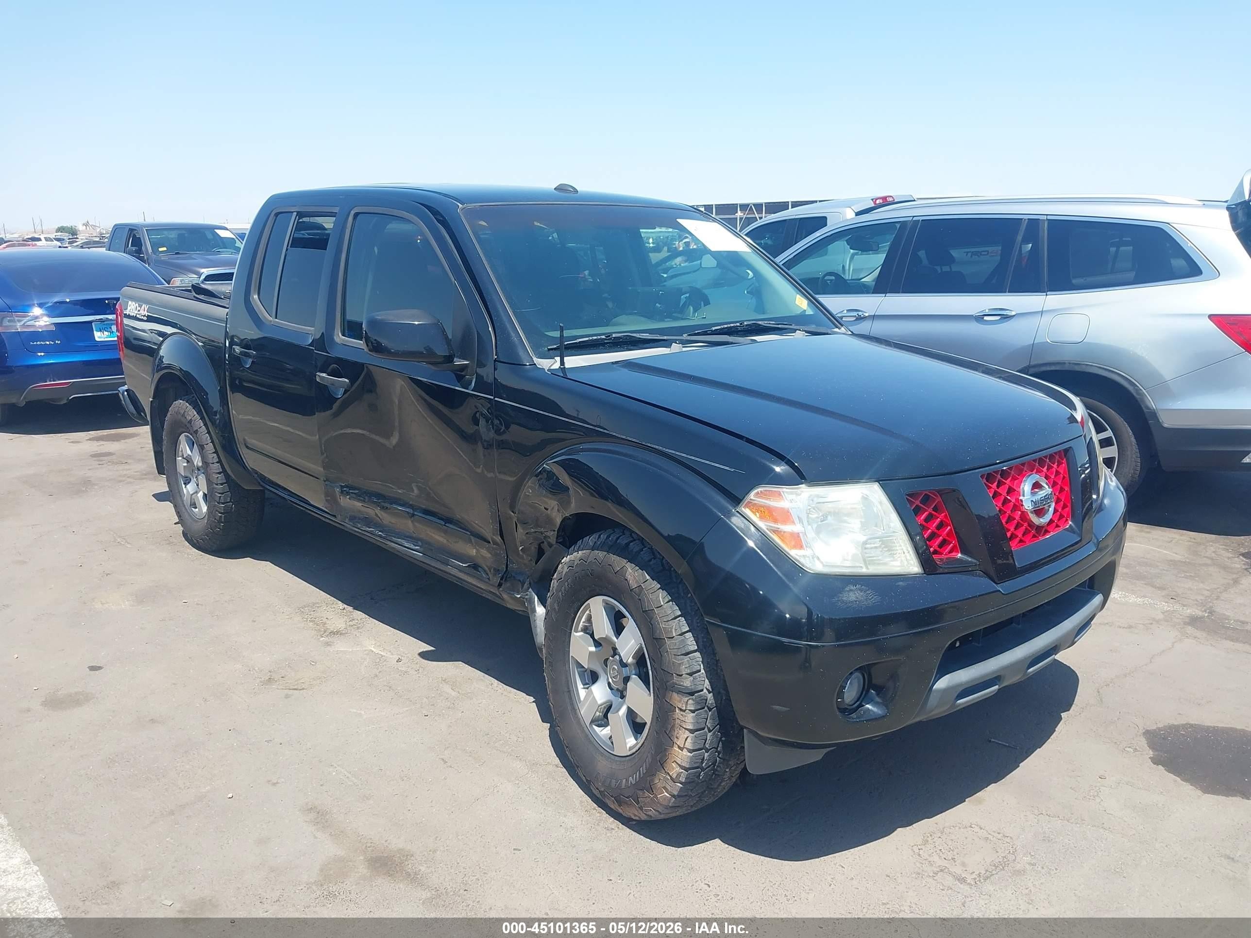 2009 Nissan Frontier SE, VIN 1N6AD07W89C401811 — Side
