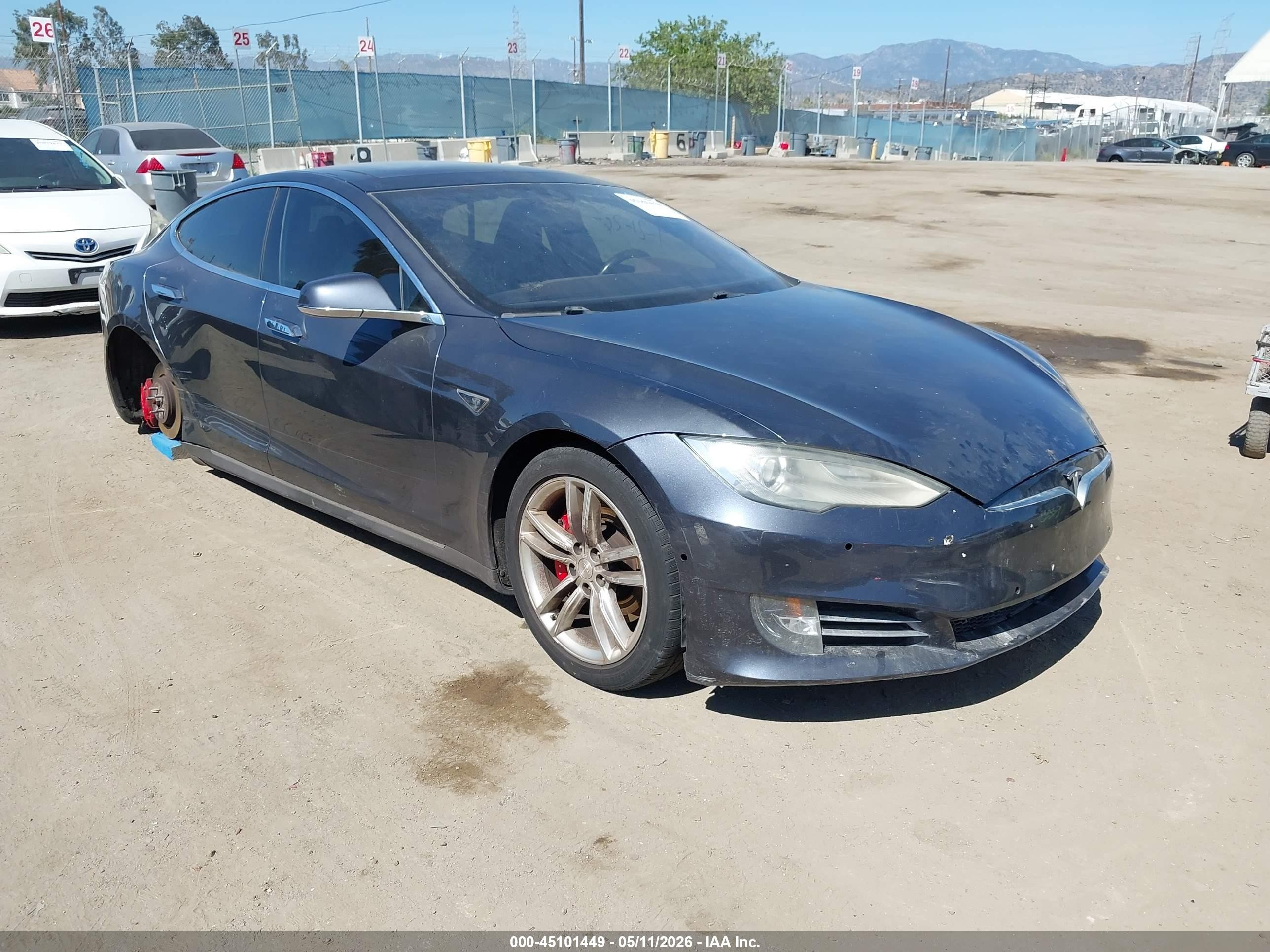 2015 Tesla Model S 85D, VIN 5YJSA1H42FF080995 — Vandalism