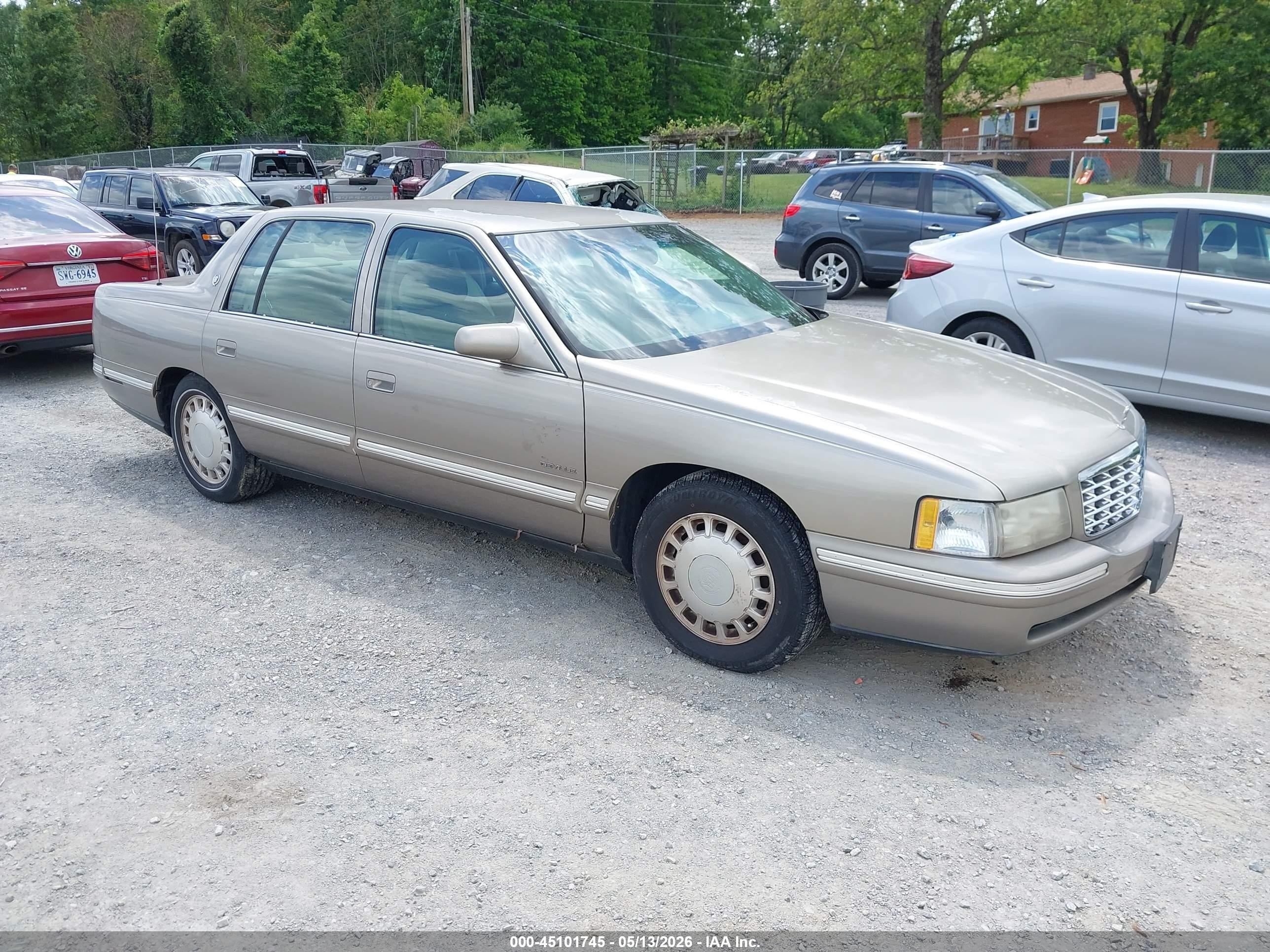 1999 Cadillac DeVille, VIN 1G6KD54Y8XU794617 — Normal wear