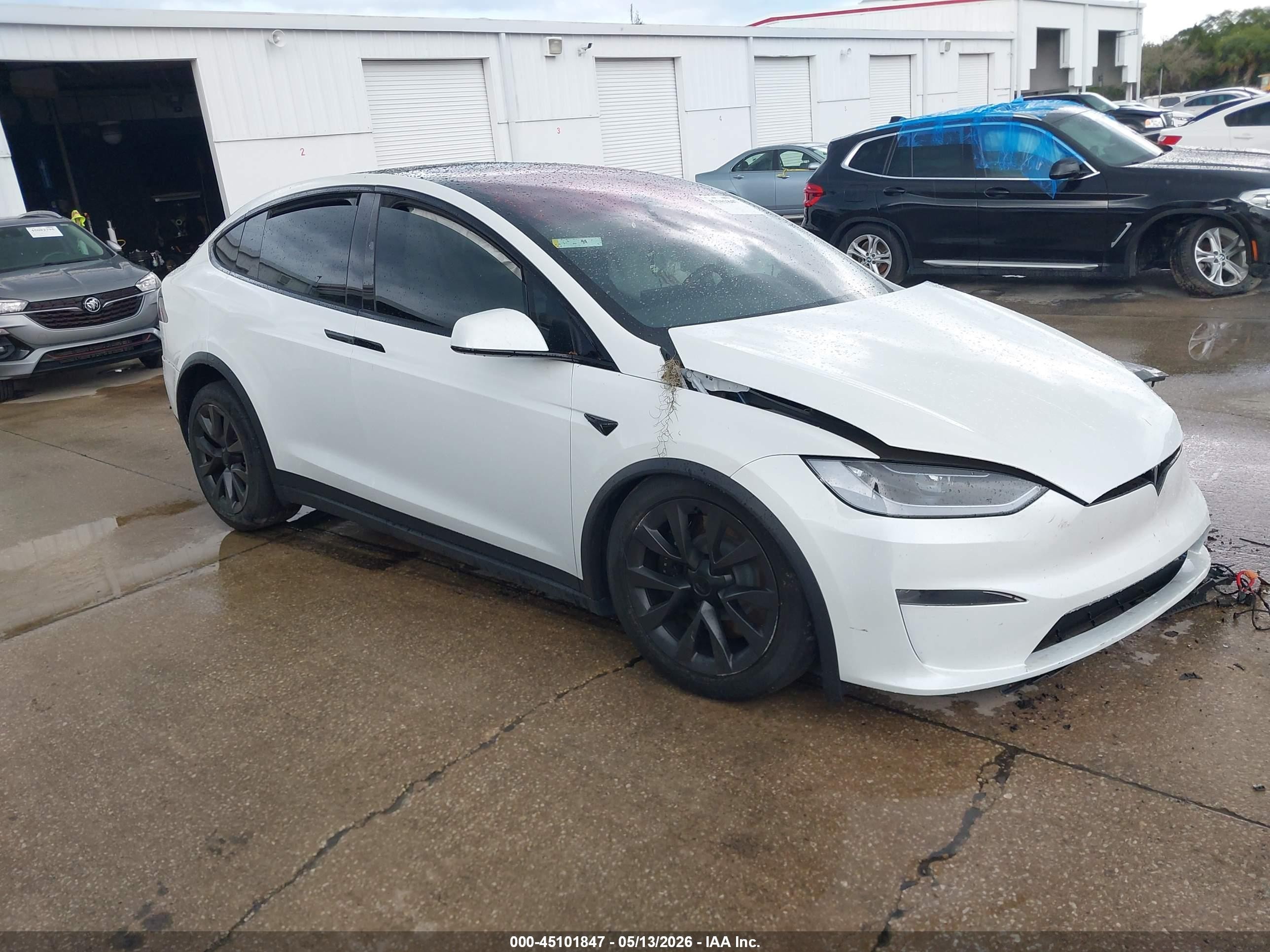2024 Tesla Model X, VIN 7SAXCDE54RF458515 — Side