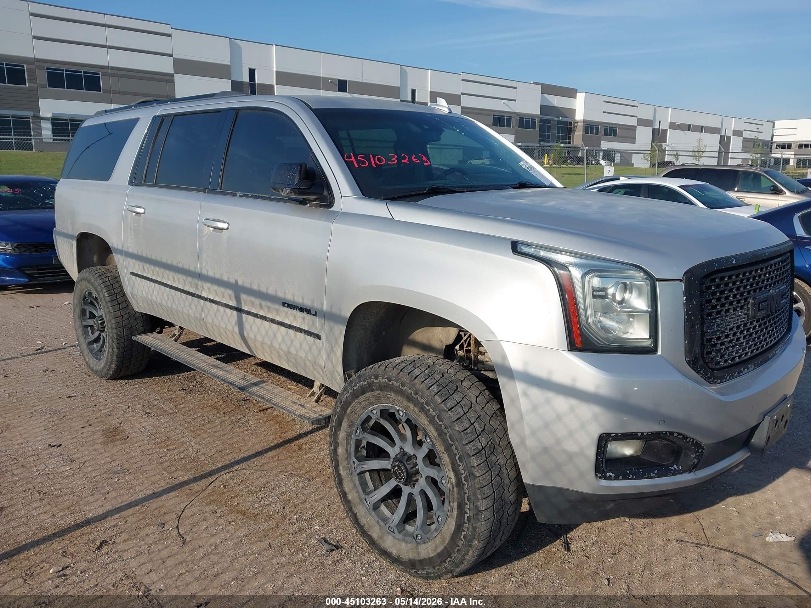 2016 GMC Yukon XL Denali, VIN 1GKS2HKJ9GR240326 — Hail