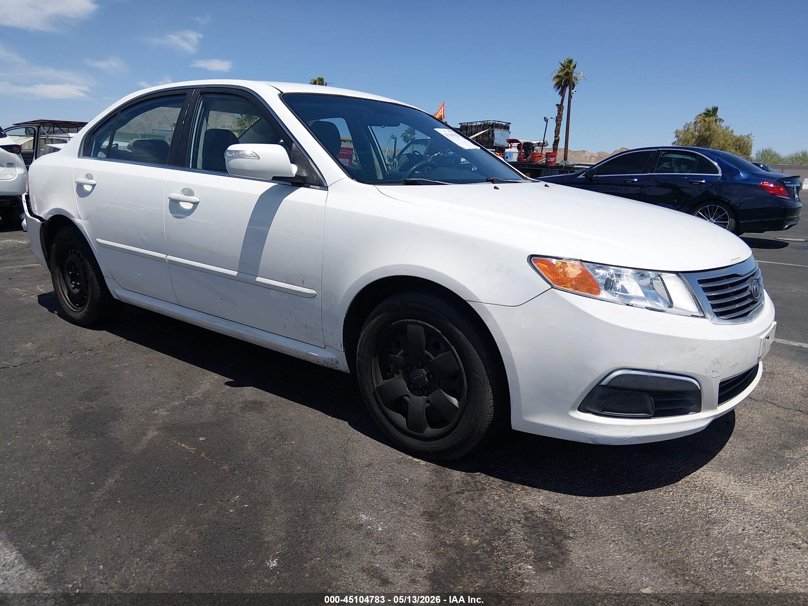 2009 Kia Optima LX, VIN KNAGE228295319167 — Зад