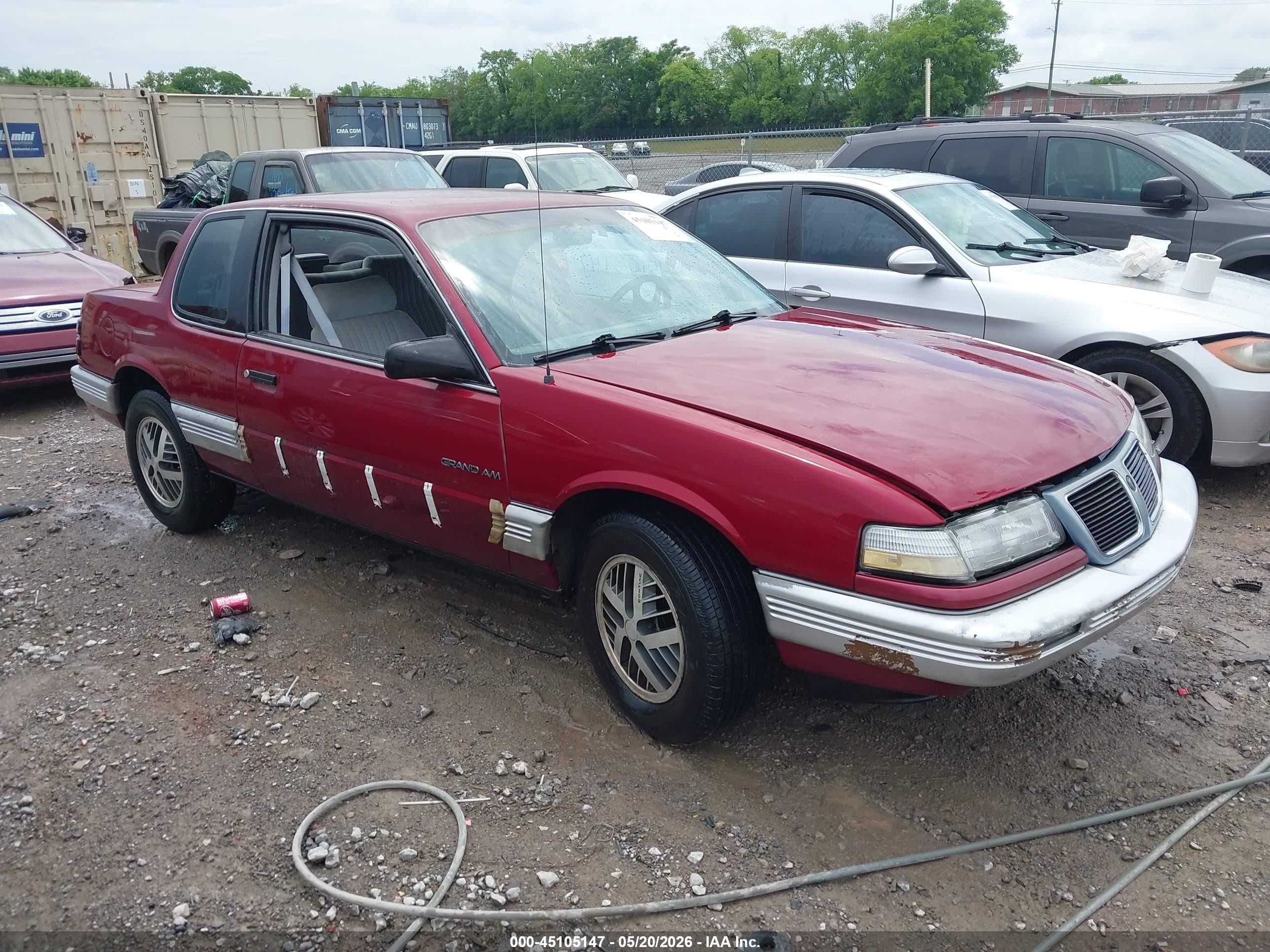 1990 Pontiac Grand Am, VIN 1G2NE14U2LC384154 — Normal wear