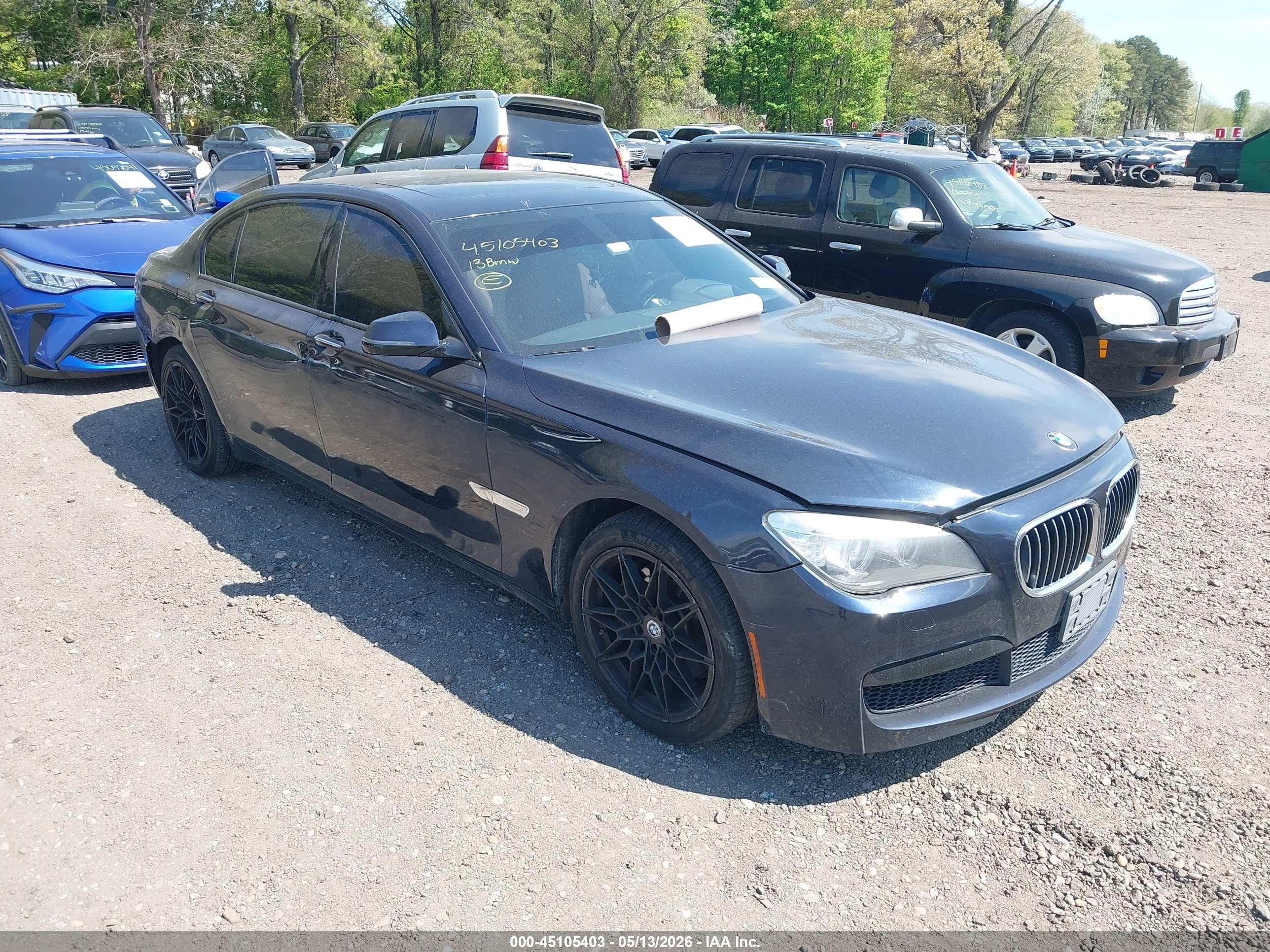 2013 BMW 7 Series 740Li xDrive, VIN WBAYF4C56DD127816 — Rear end