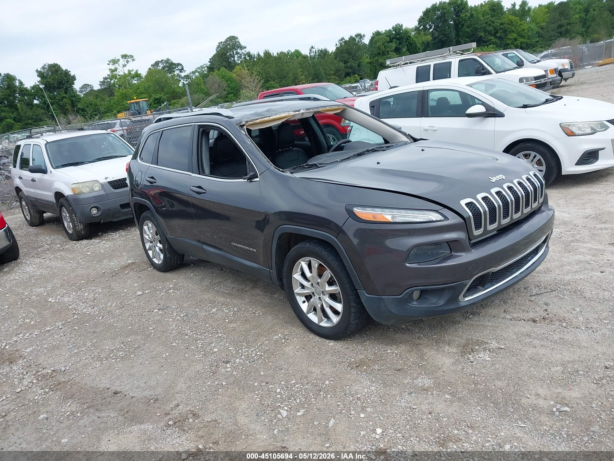 2015 Jeep Cherokee Limited, VIN 1C4PJLDSXFW572708 — Storm
