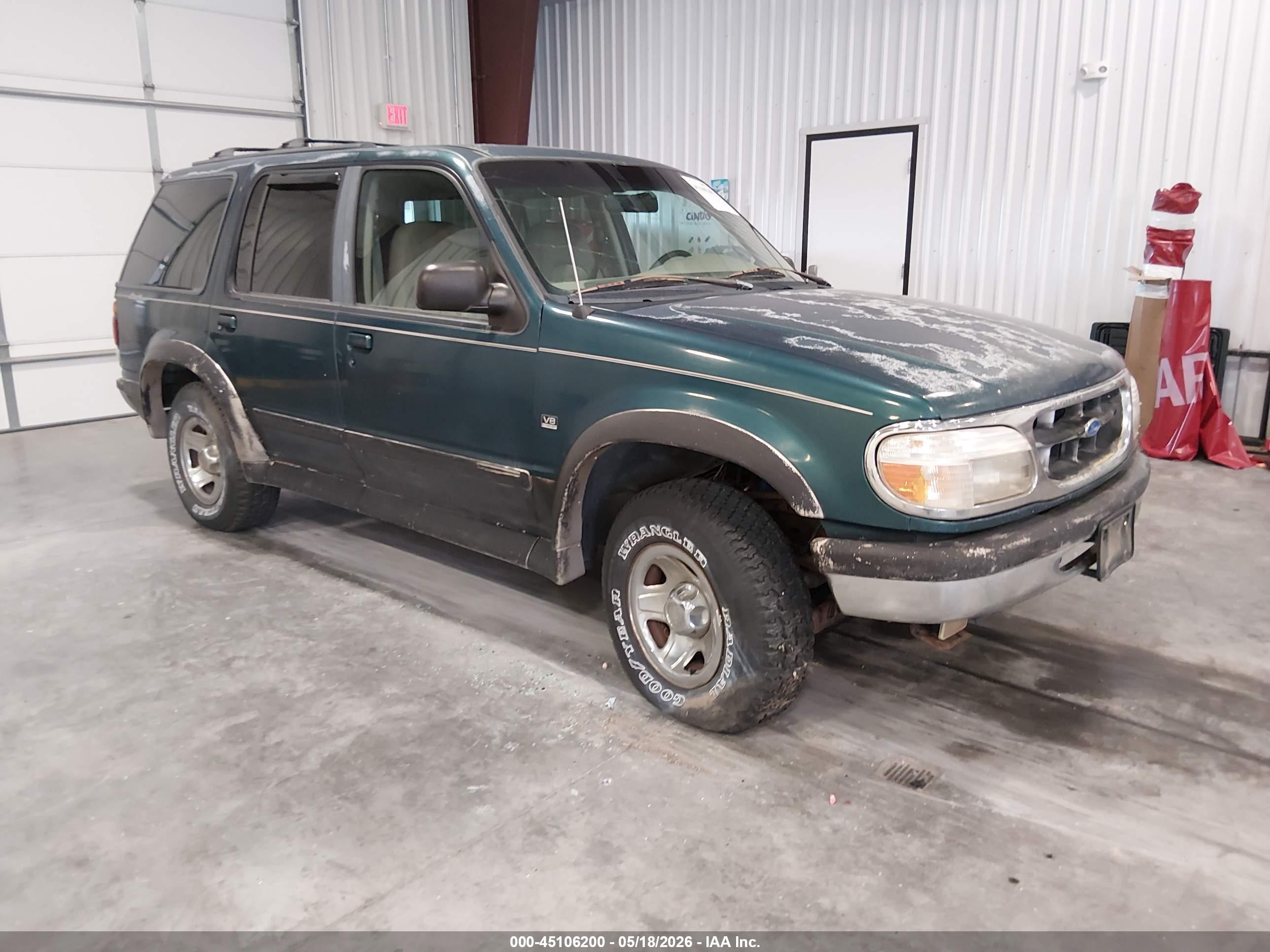 1997 Ford Explorer XLT, VIN 1FMDU35P7VUC53048 — Side