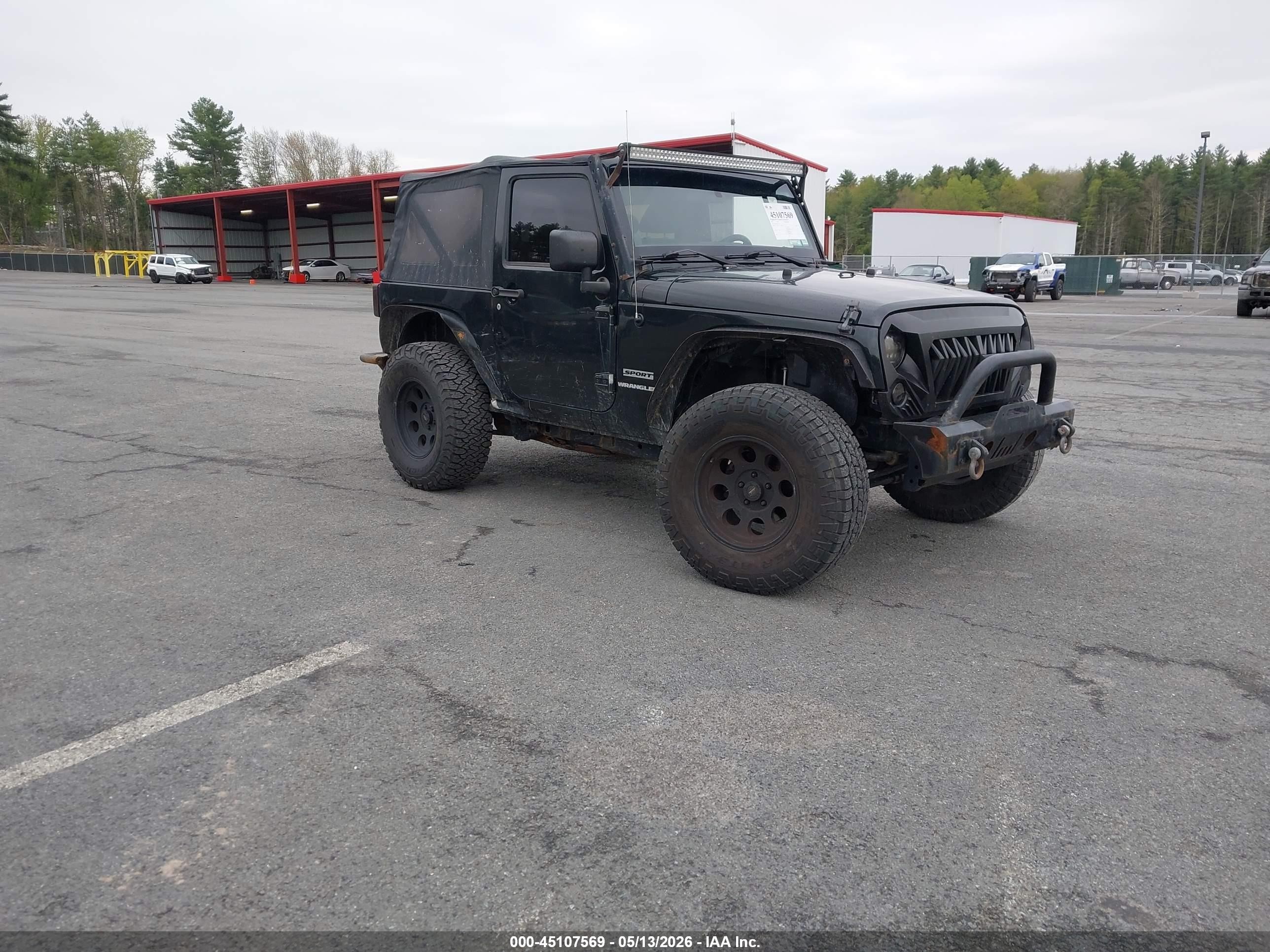 2012 Jeep Wrangler Sport, VIN 1C4AJWAG4CL241417 — Side