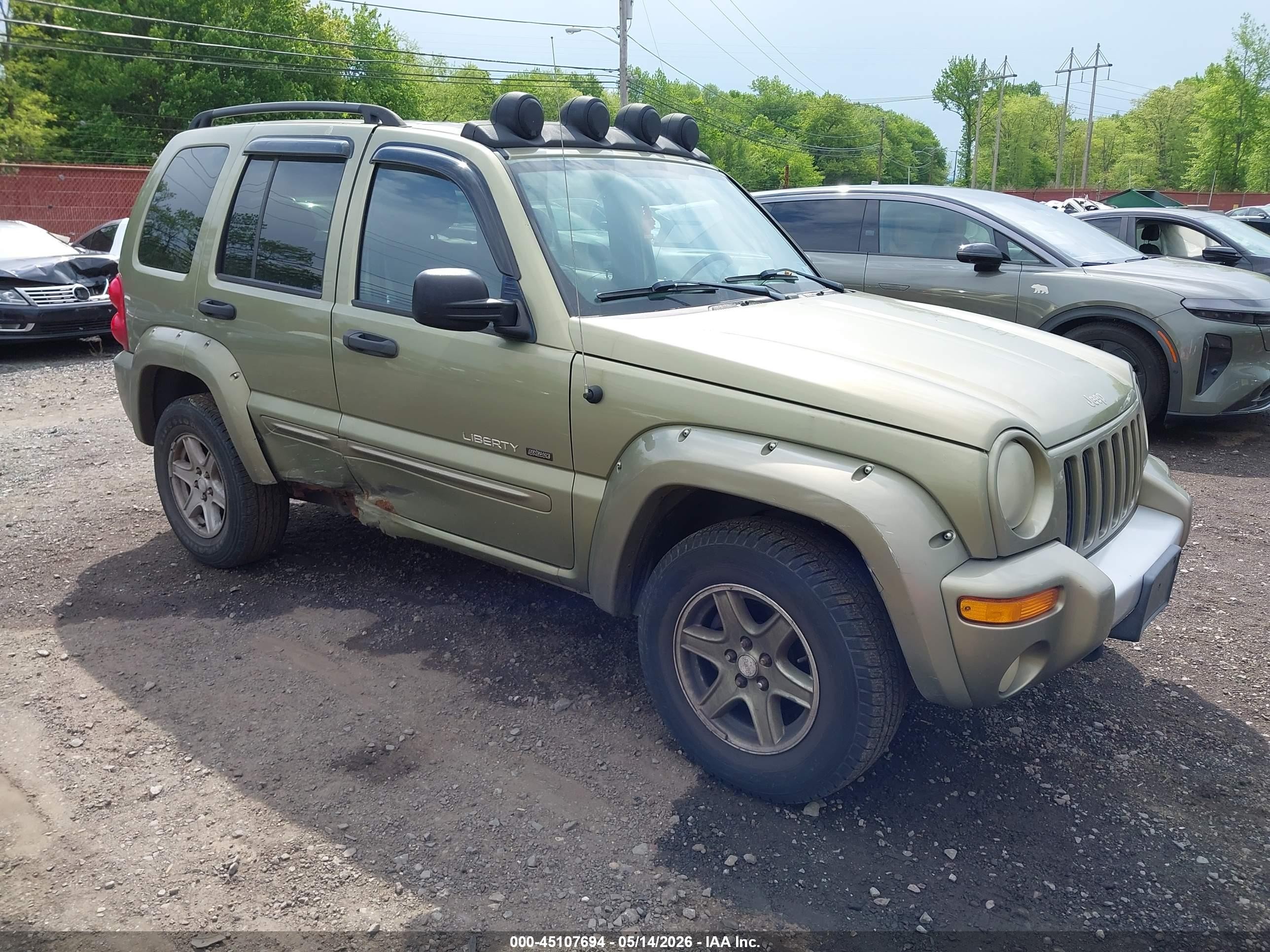 2003 Jeep Liberty Renegade, VIN 1J4GL38K03W565065 — Бок