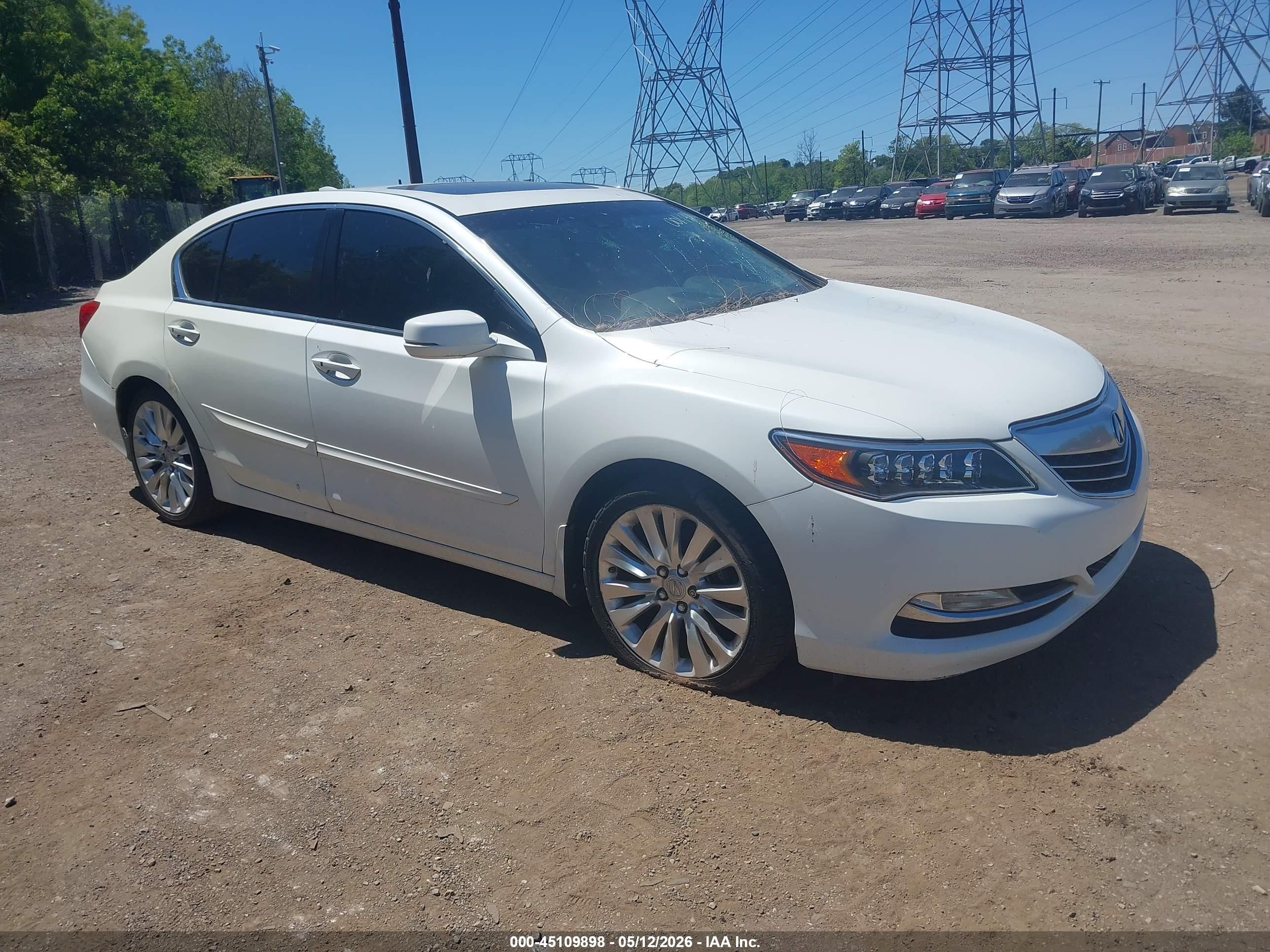 2014 Acura RLX Technology, VIN JH4KC1F54EC001441 — Vandalism