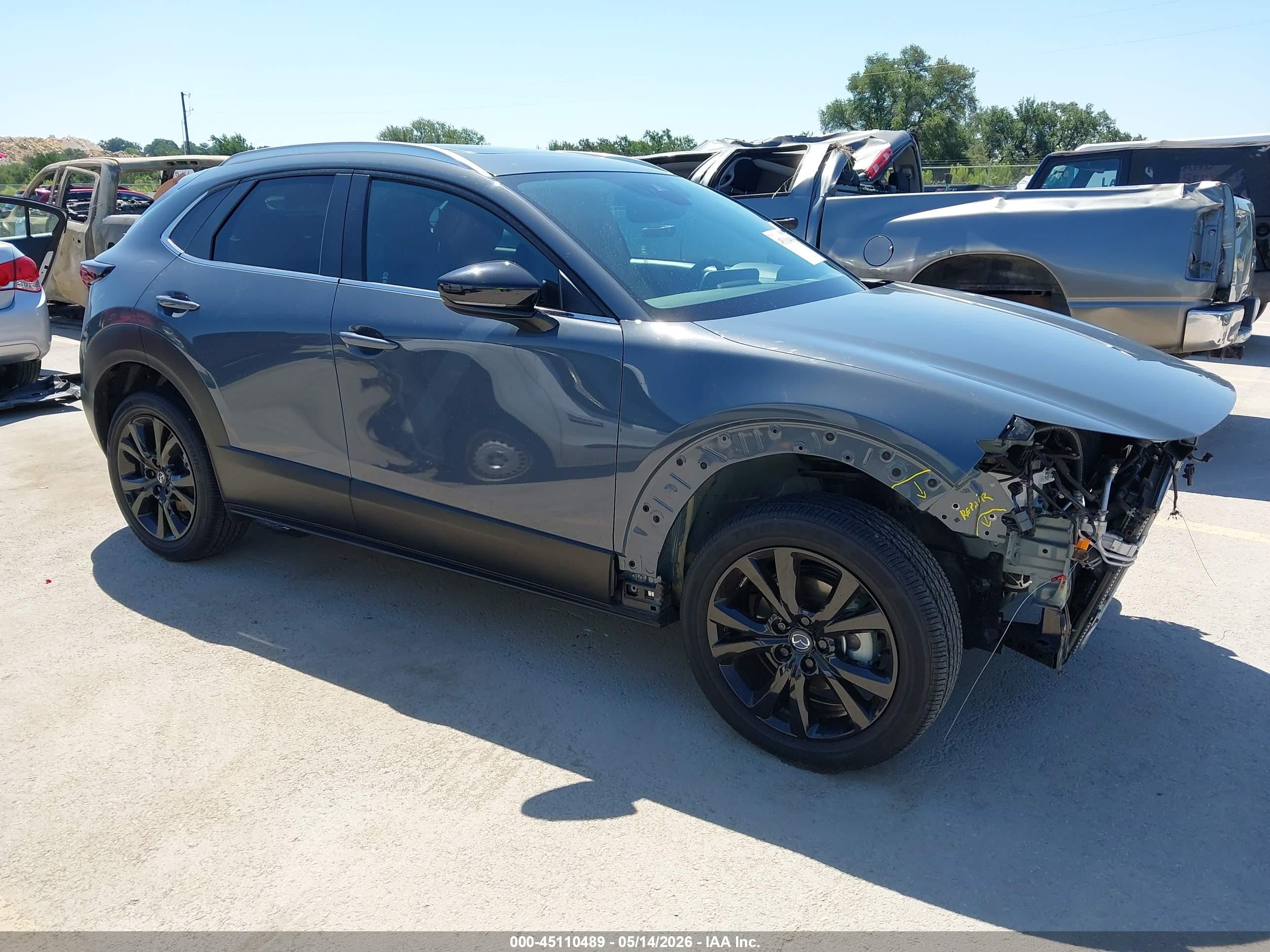 2023 Mazda CX-30 S Carbon Edition, VIN 3MVDMBCM0PM556976 — Front end
