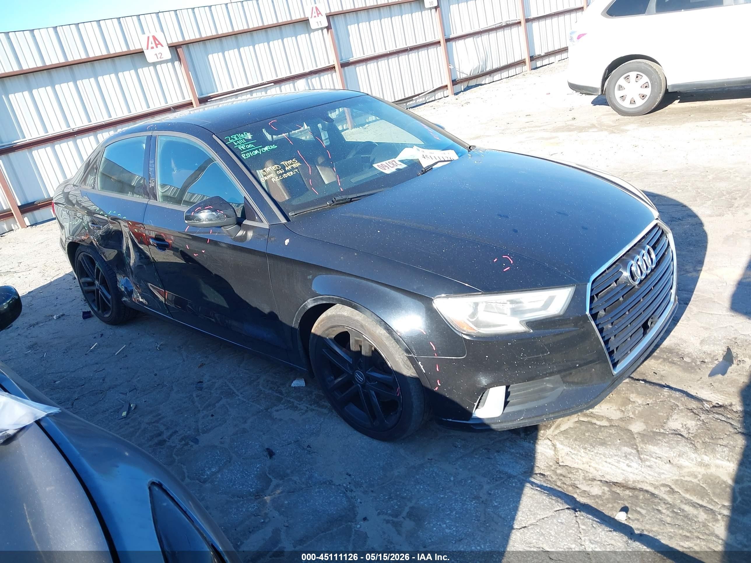 2018 Audi A3 Premium, VIN WAUAUGFF7J1023765 — Side