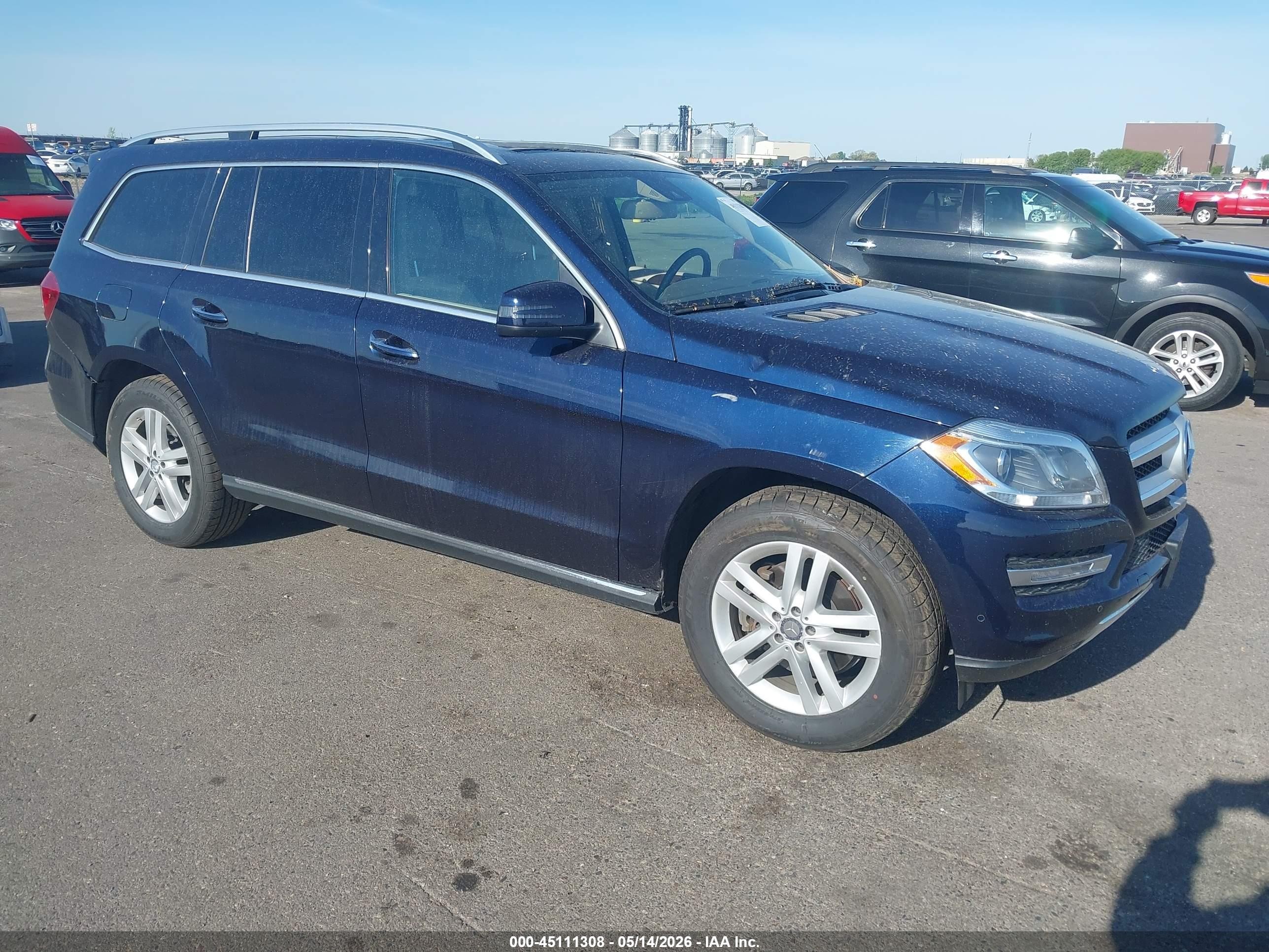 2016 Mercedes-Benz GL 450, VIN 4JGDF6EE4GA706766 — Storm