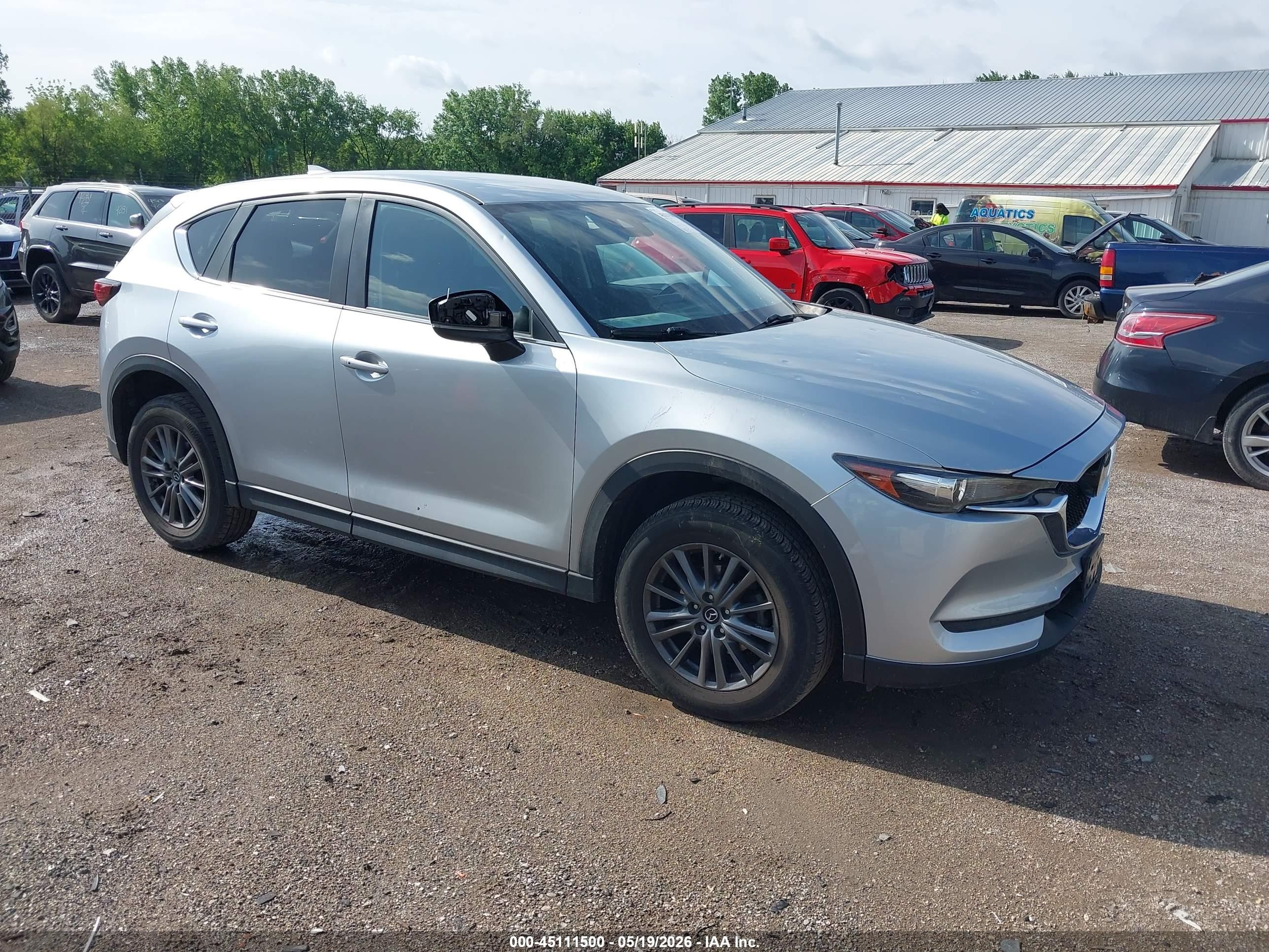 2020 Mazda CX-5 Touring, VIN JM3KFACM5L0754356 — Hail