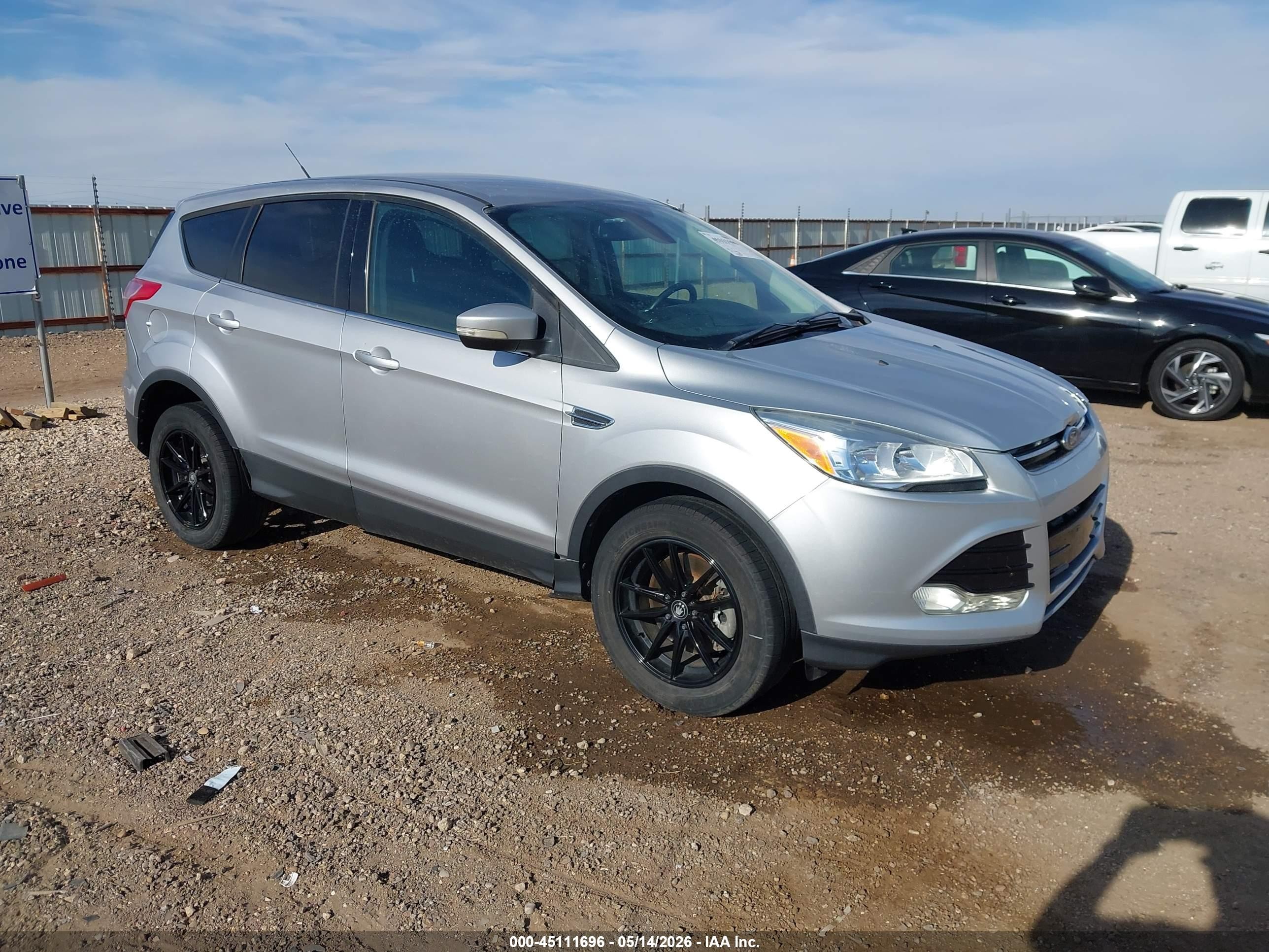 2013 Ford Escape SEL, VIN 1FMCU9H92DUD88285 — Rear end