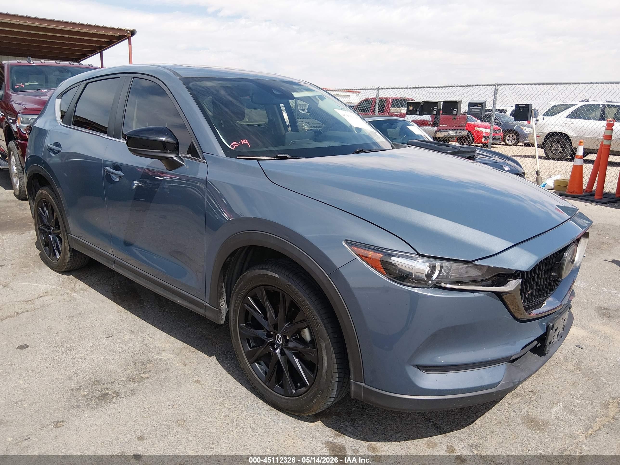 2021 Mazda CX-5 Carbon Edition, VIN JM3KFBCM3M0397959 — Side