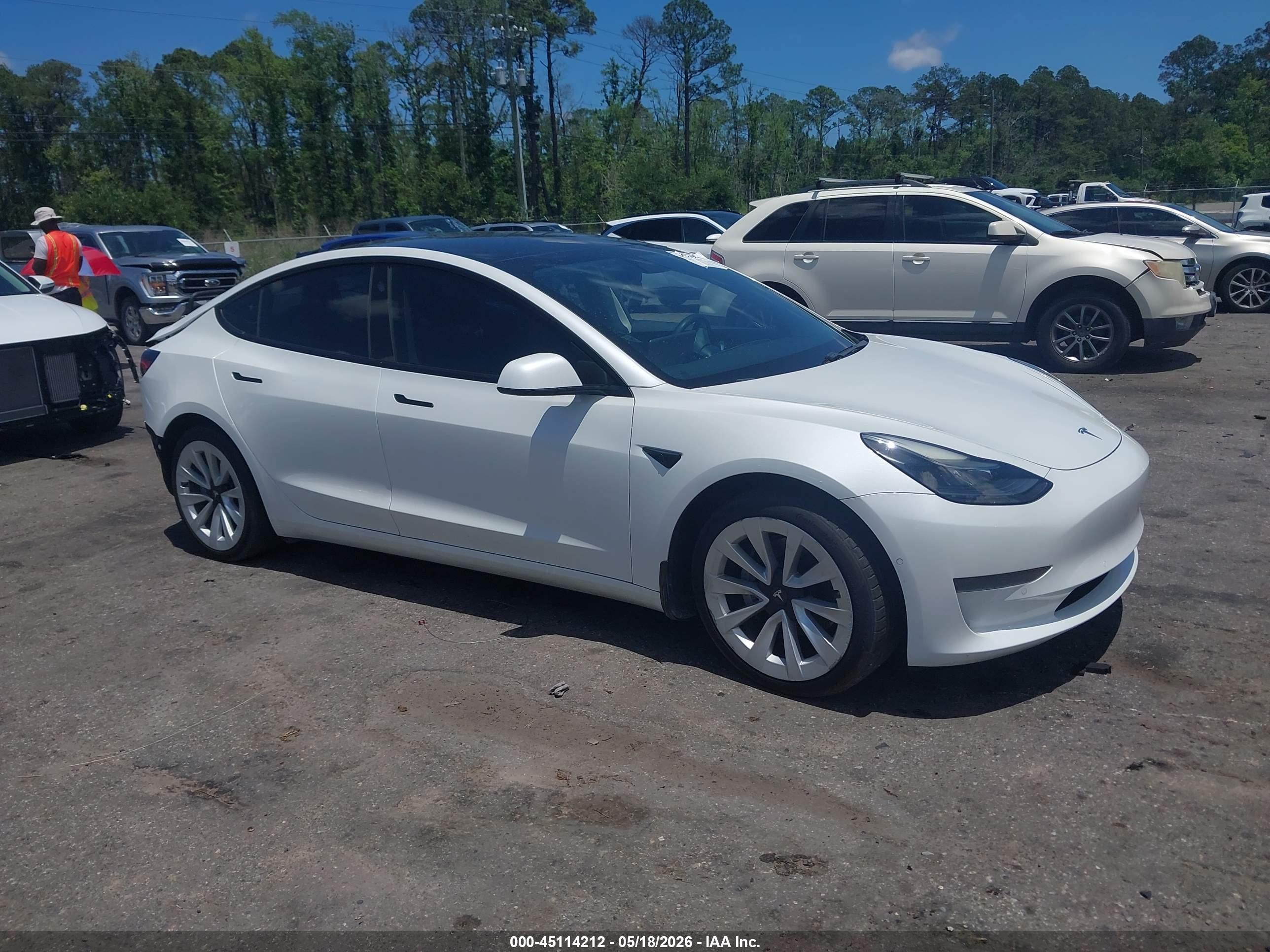2021 Tesla Model 3 Standard Range Plus, VIN 5YJ3E1EA8MF045569 — Rear end