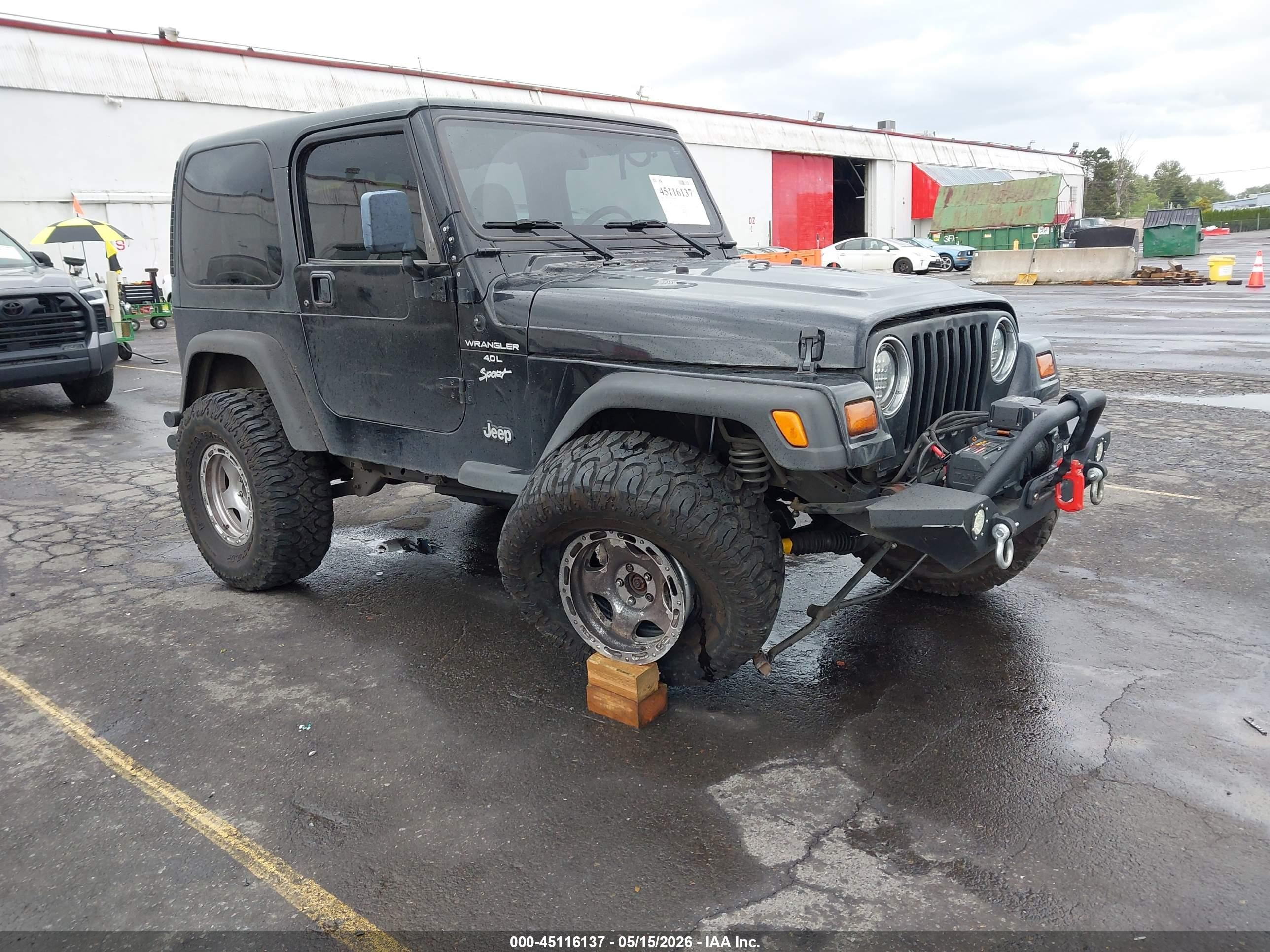 1999 Jeep Wrangler Sport, VIN 1J4FY19S3XP468300 — Front end