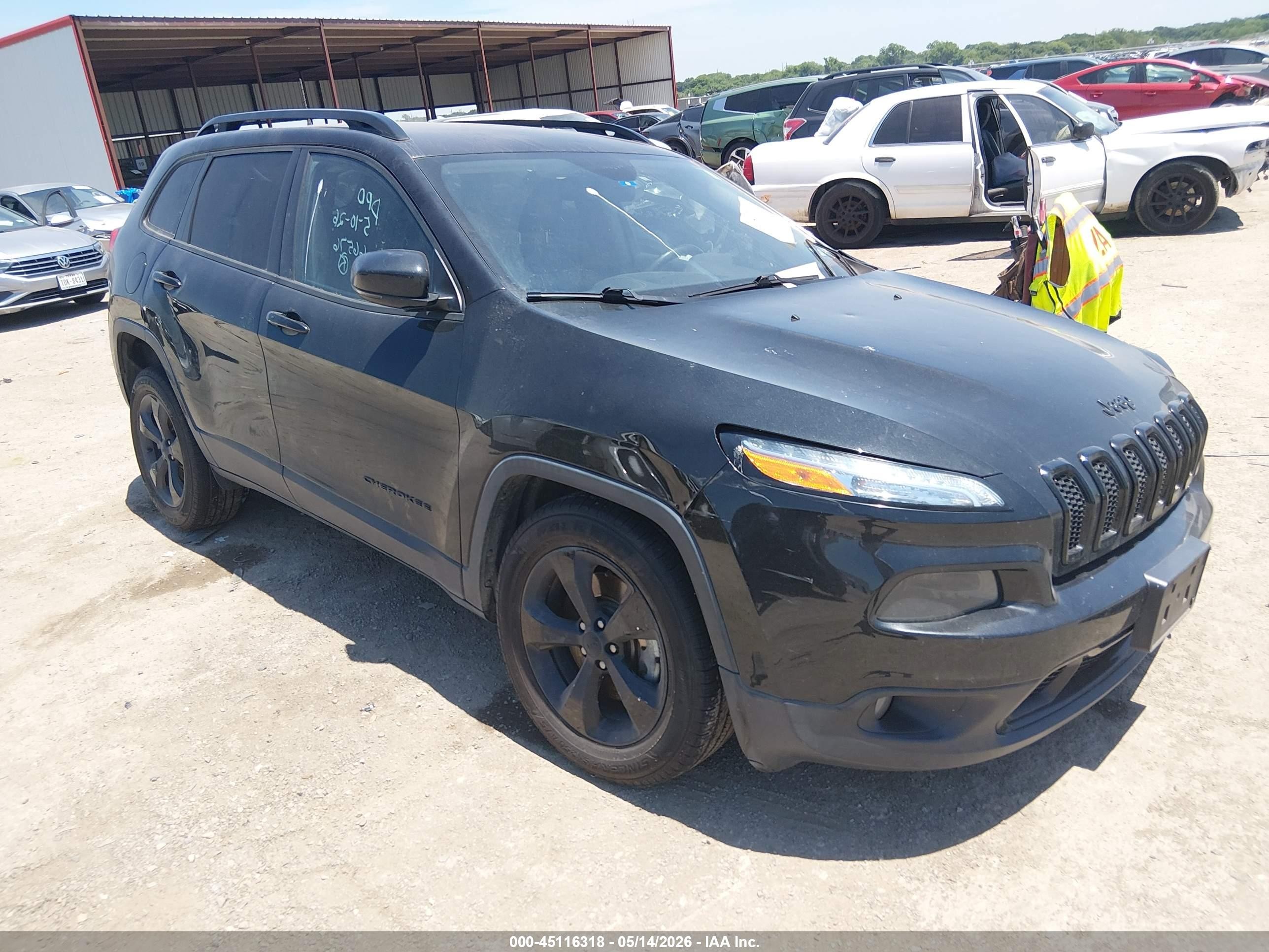 2016 Jeep Cherokee Limited, VIN 1C4PJMDB2GW314237 — Side