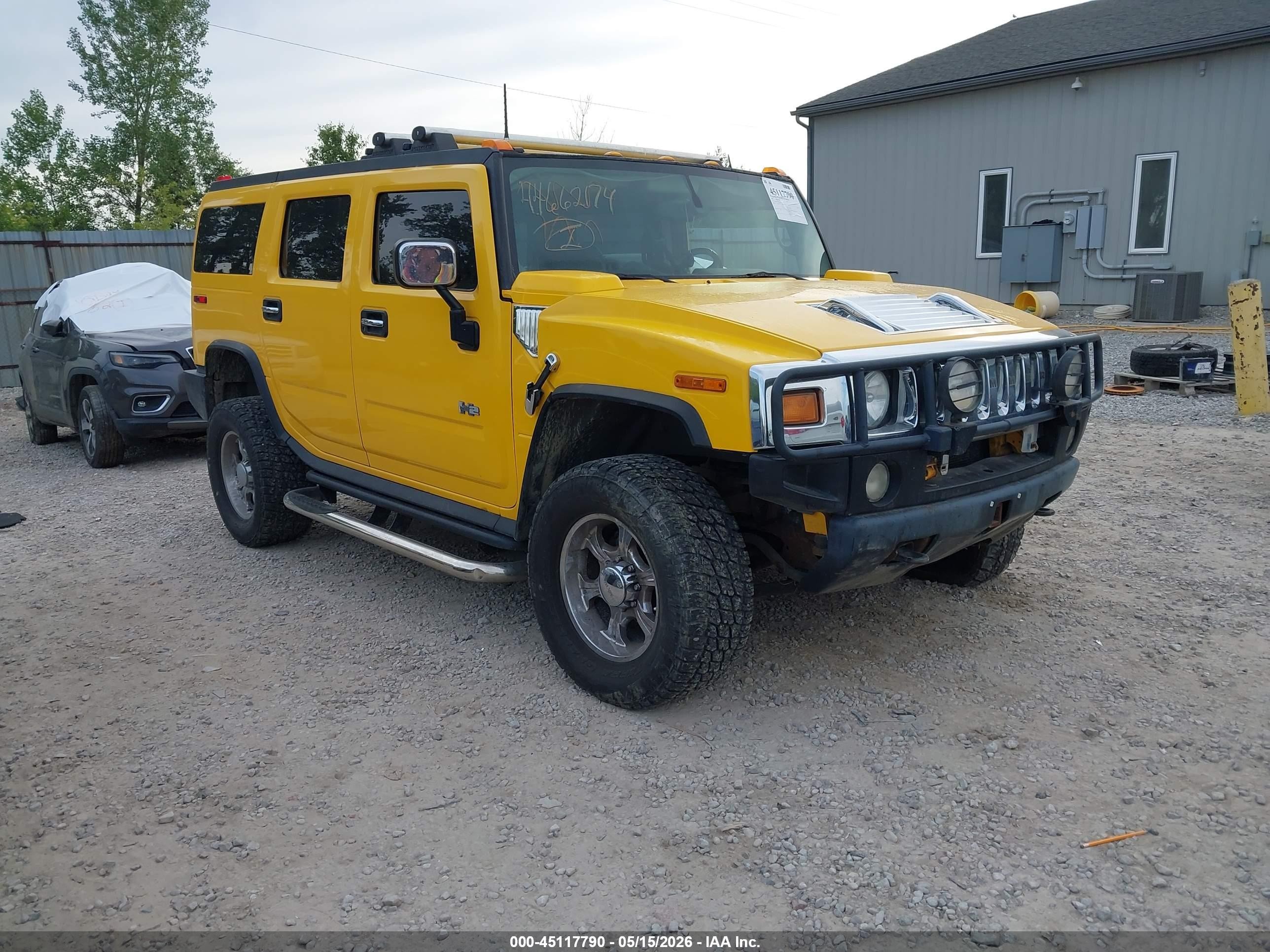 2003 Hummer H2, VIN 5GRGN23U13H115110 — Бок