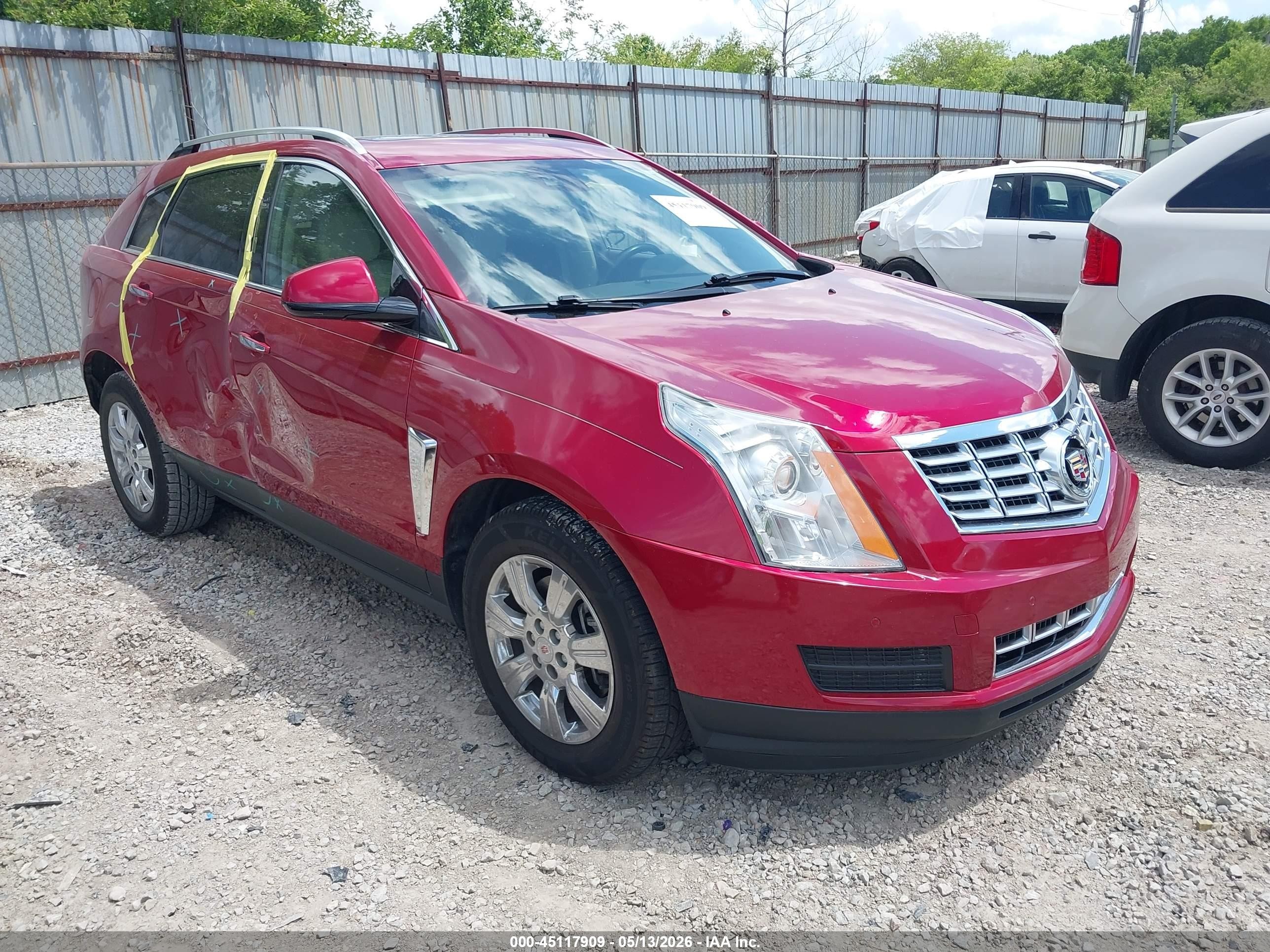 2016 Cadillac SRX Luxury Collection, VIN 3GYFNBE31GS573111 — Side