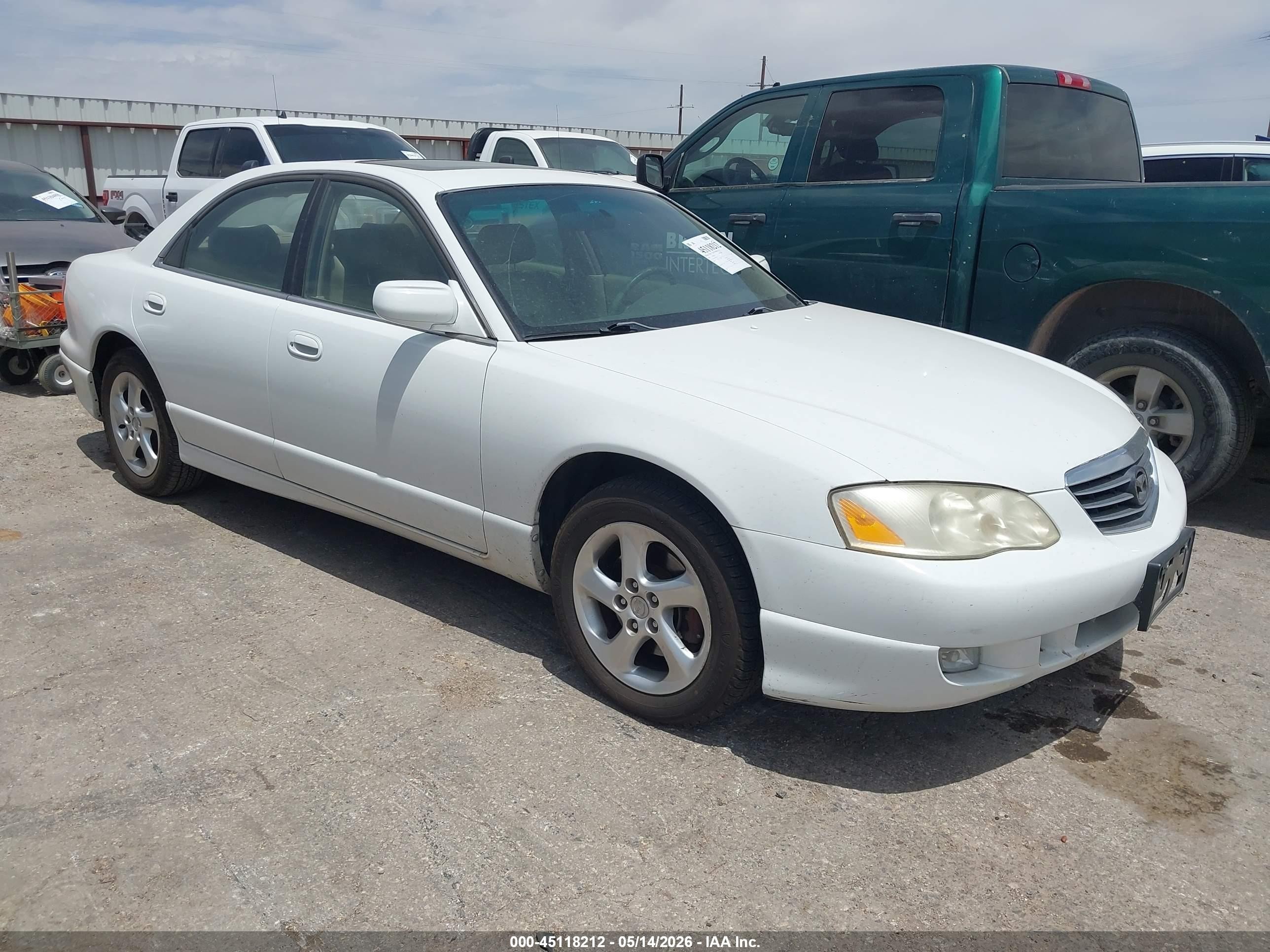 2001 Mazda Millenia, VIN JM1TA221811702302 — Normal wear