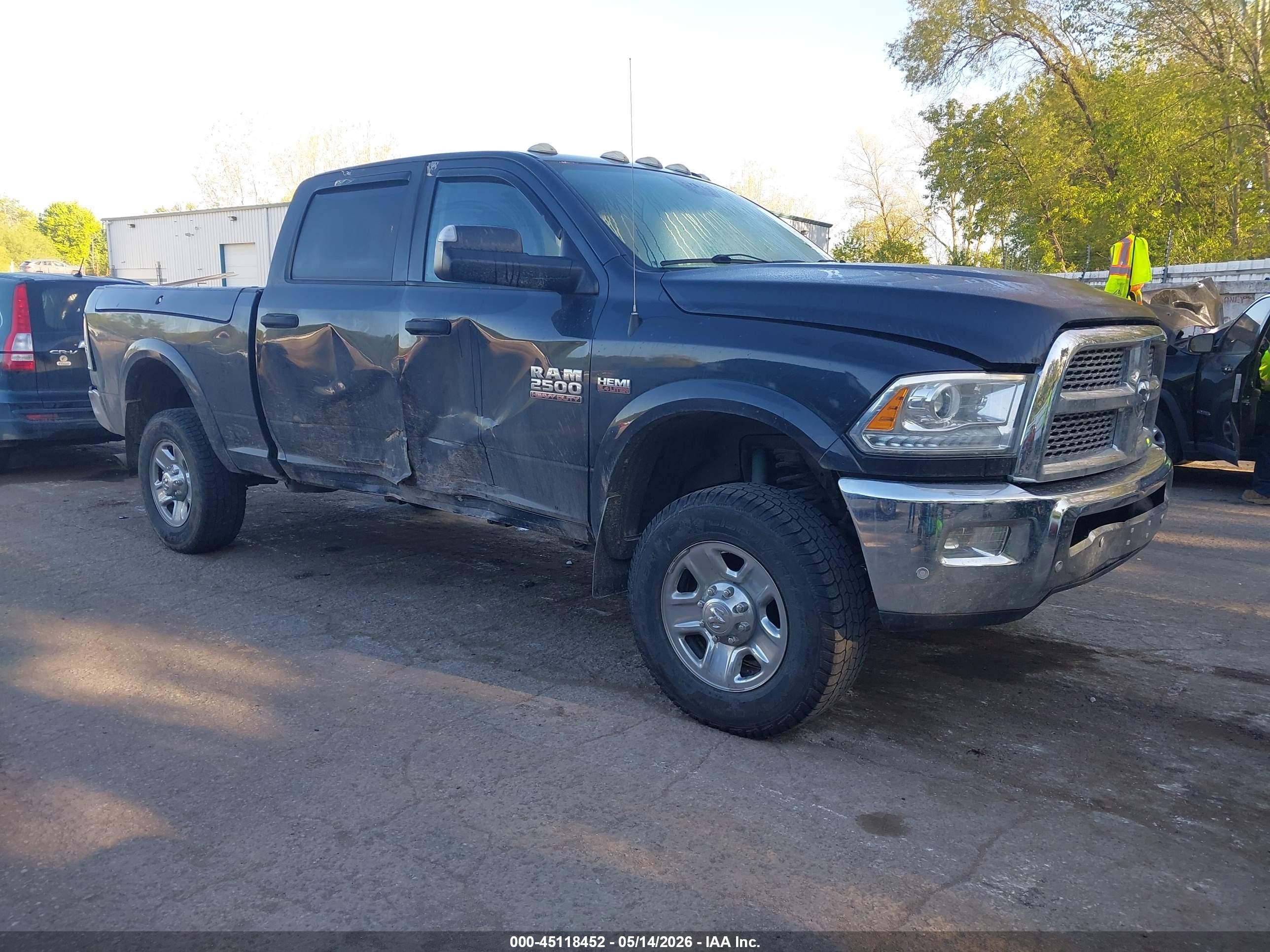 2016 Ram 2500 Laramie Power Wagon, VIN 3C6TR5FJ9GG287139 — Side