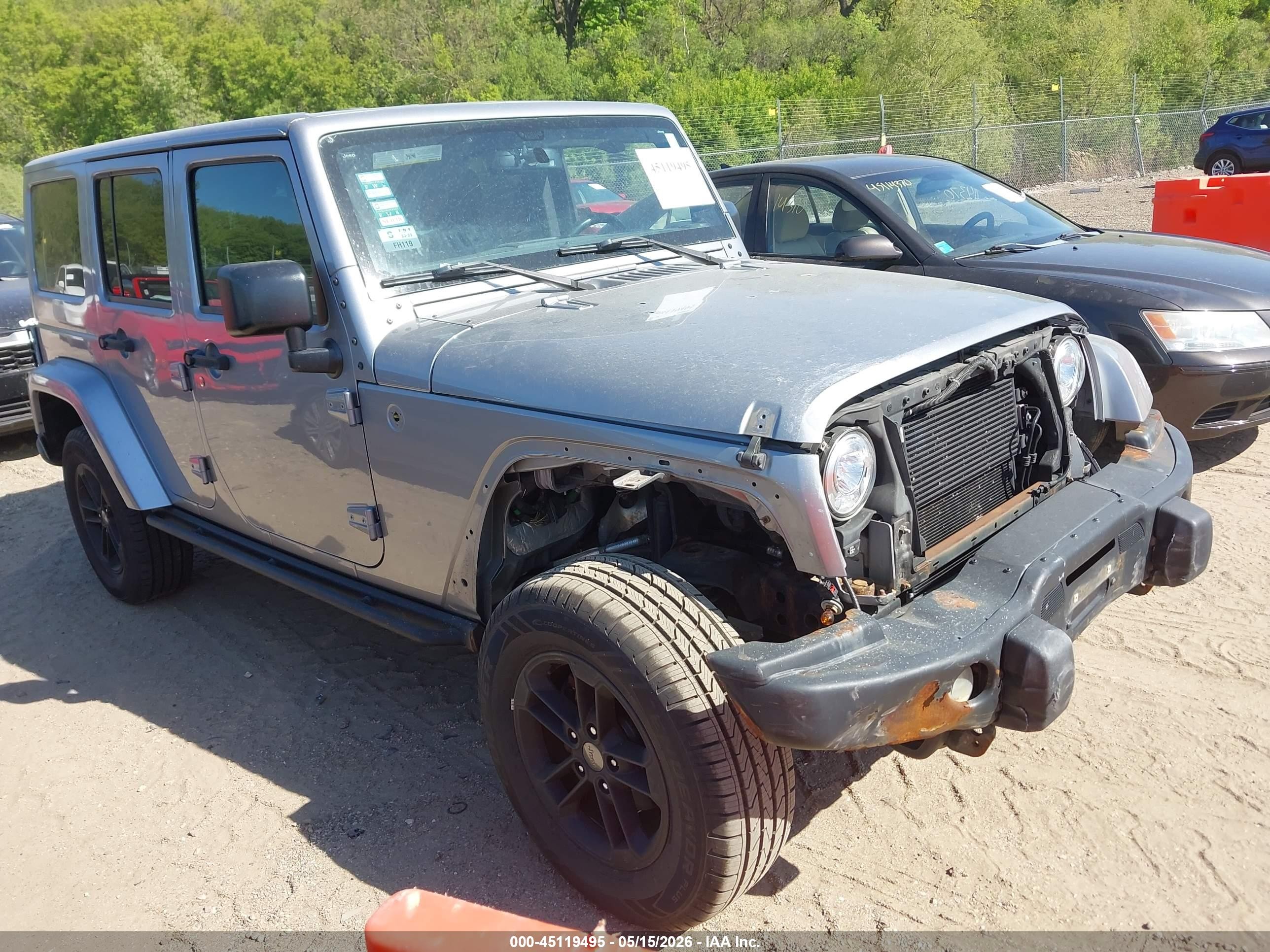 2017 Jeep Wrangler Unlimited Sahara, VIN 1C4HJWEG5HL562141 — Front end
