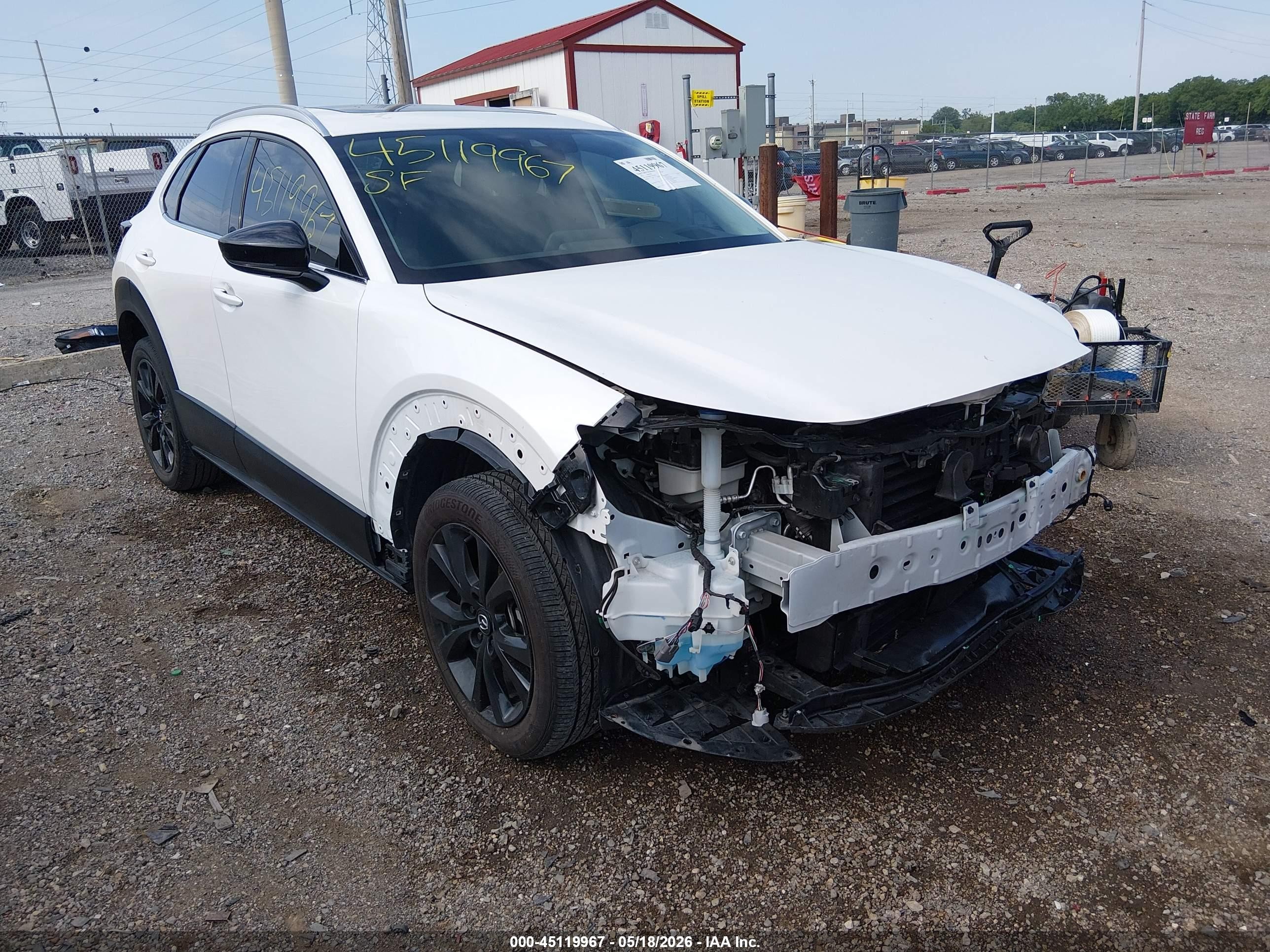 2023 Mazda CX-30 Premium, VIN 3MVDMBDY1PM558222 — Front end