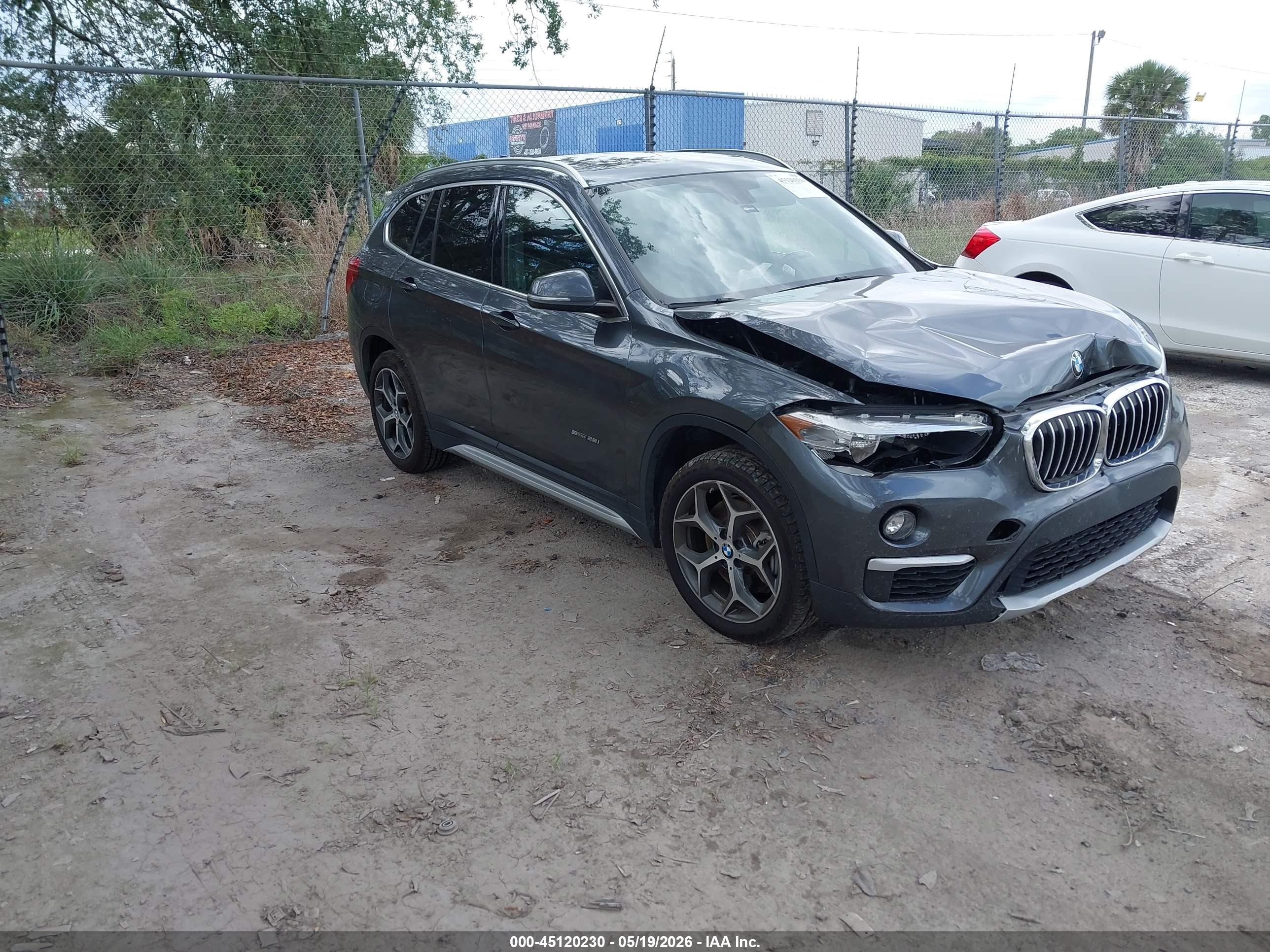 2018 BMW X1 sDrive28i, VIN WBXHU7C34J5H40893 — Front end