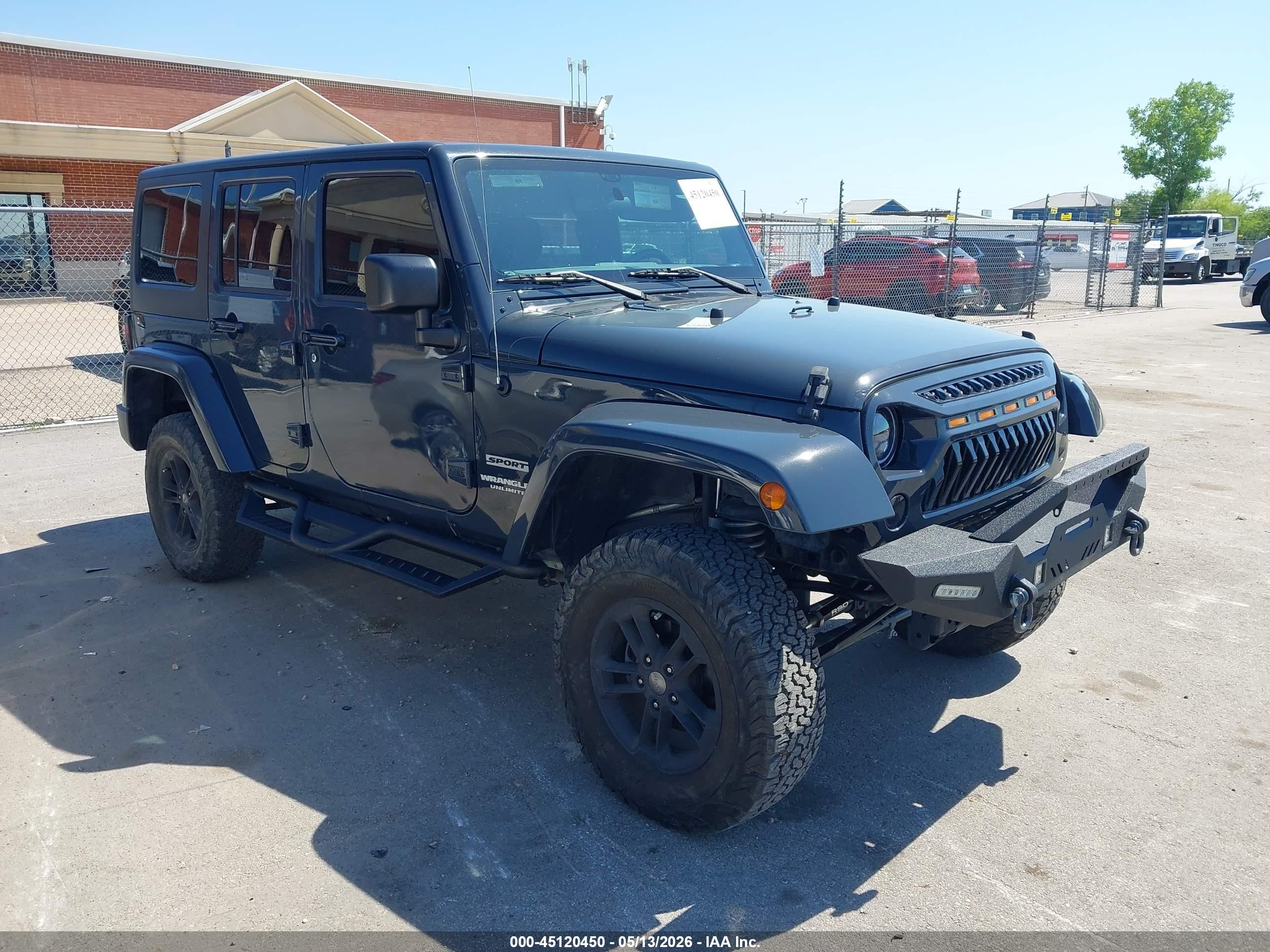 2017 Jeep Wrangler Unlimited Sport, VIN 1C4BJWDG9HL665098 — Side