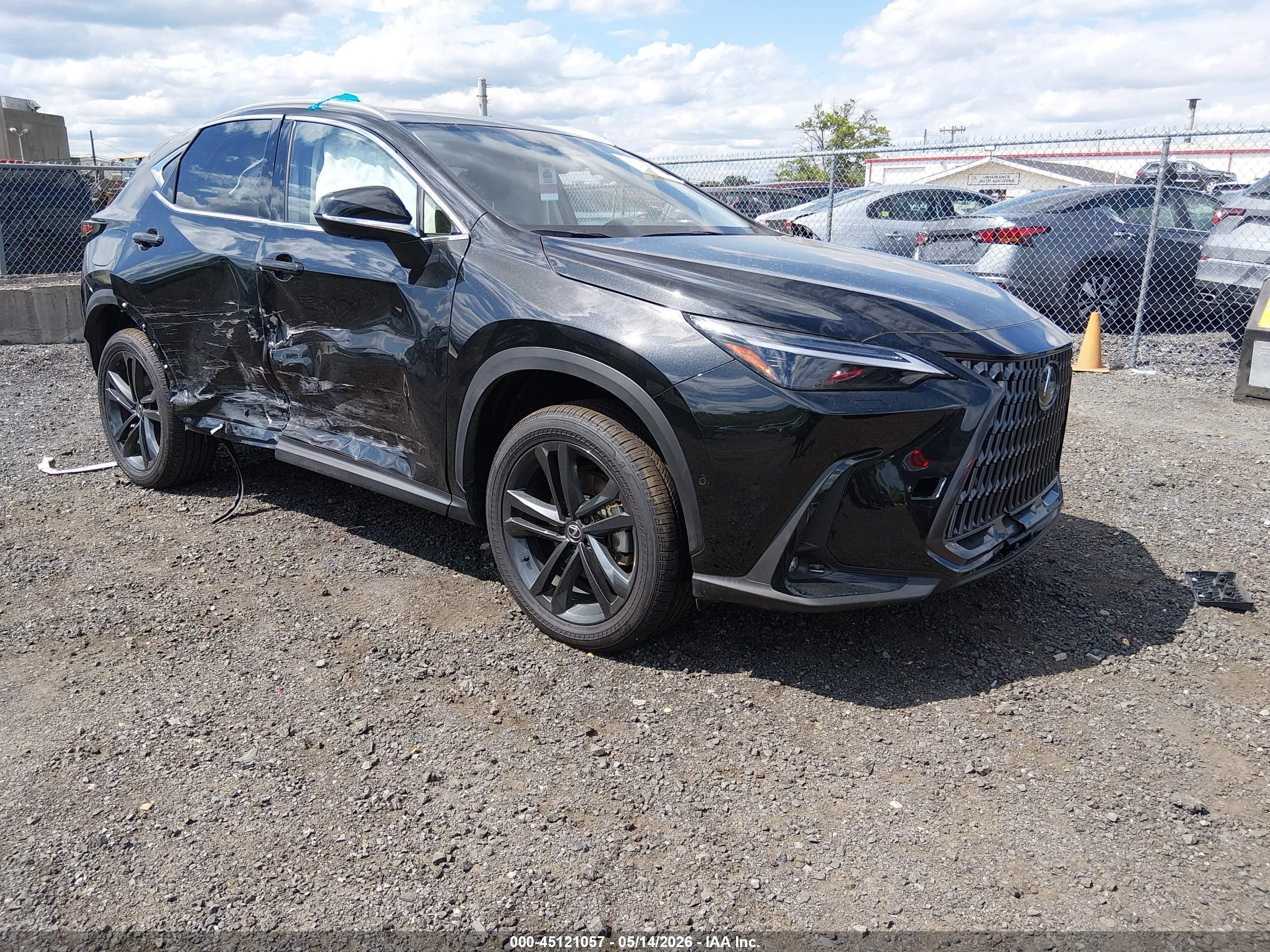 2025 Lexus NX 450h+ Luxury, VIN JTJHKCFZ5S2052765 — Side