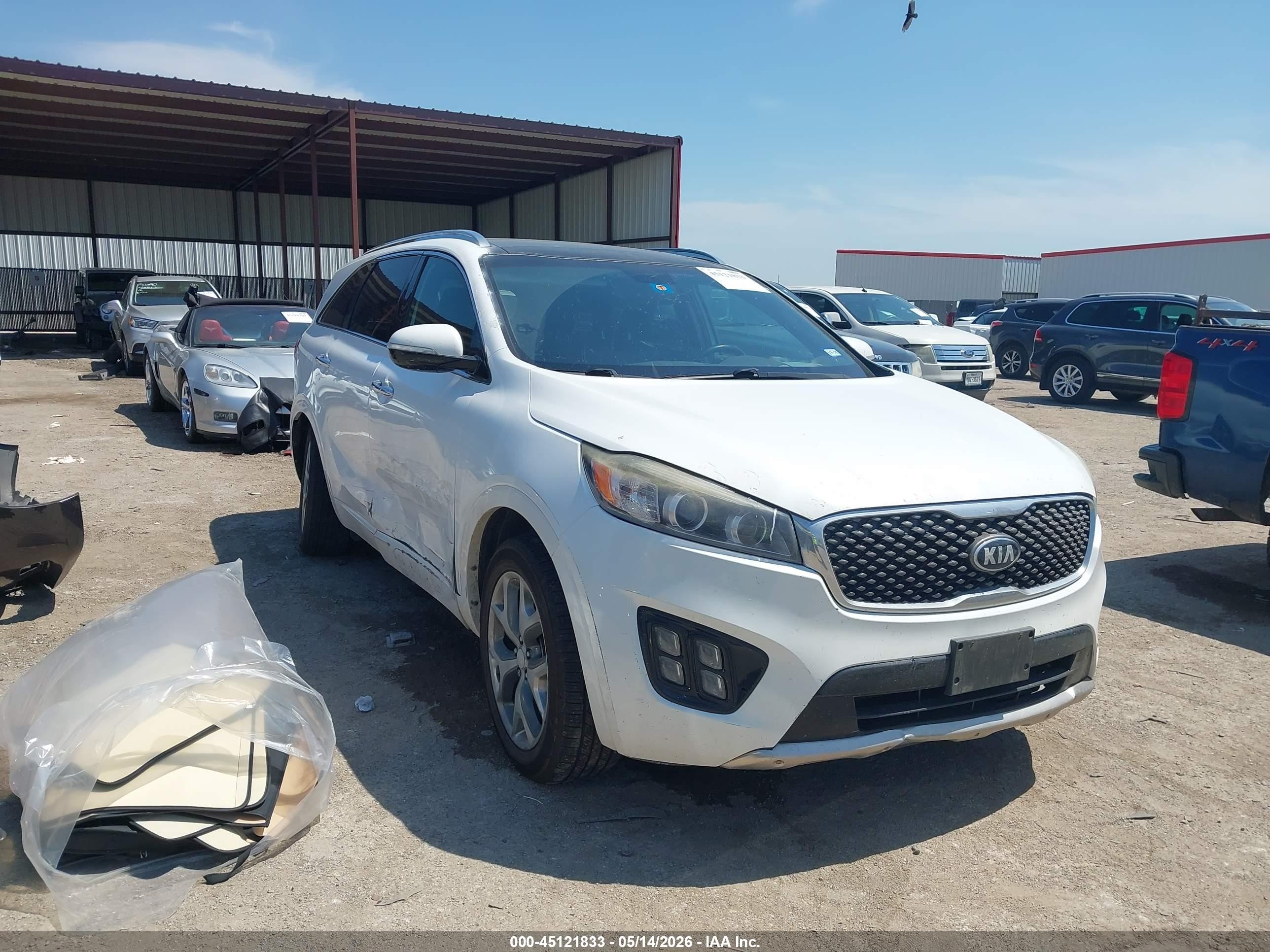 2016 Kia Sorento SXL, VIN 5XYPK4A19GG007847 — Side