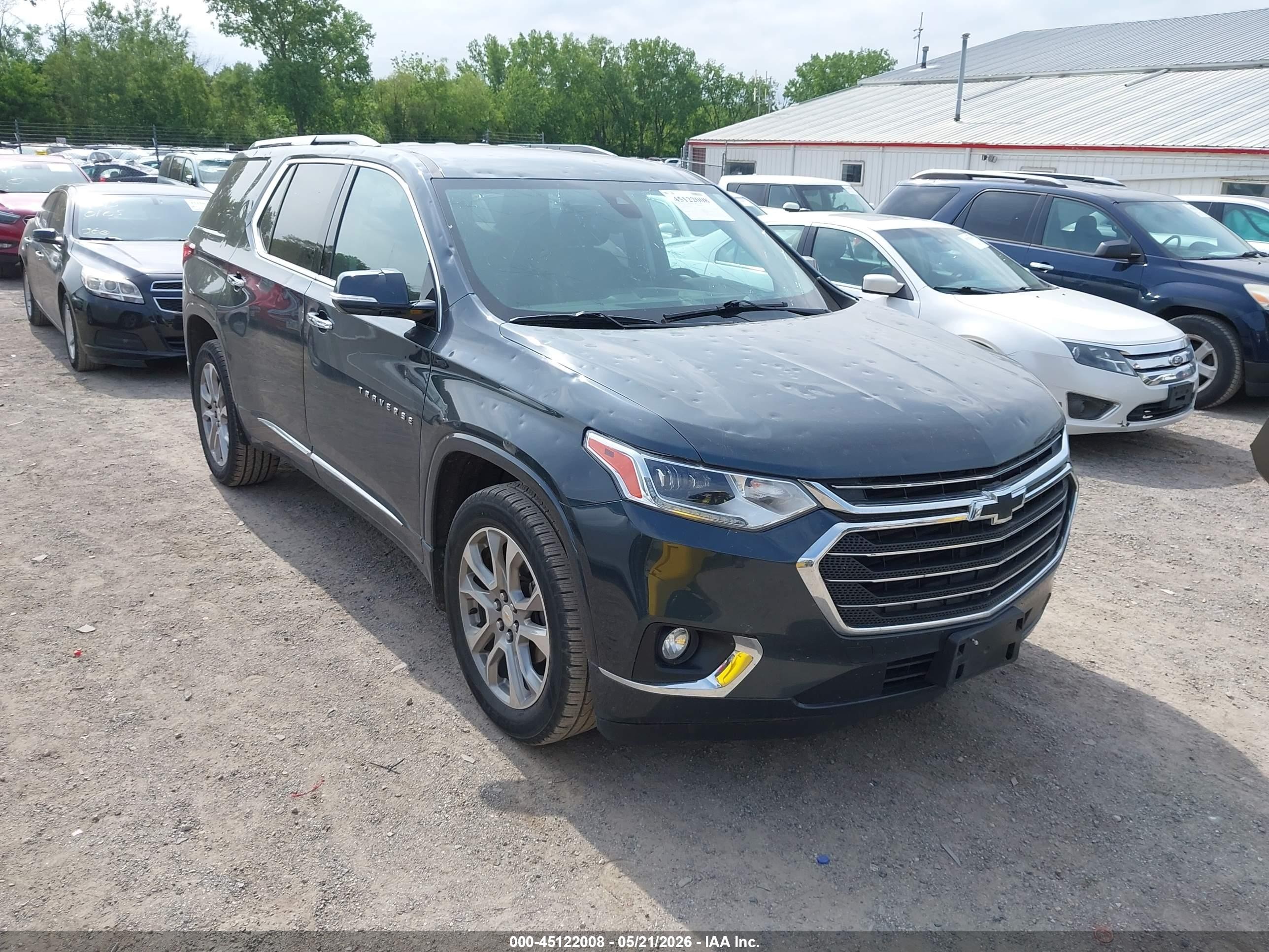 2019 Chevrolet Traverse Premier, VIN 1GNEVKKW8KJ105202 — Hail