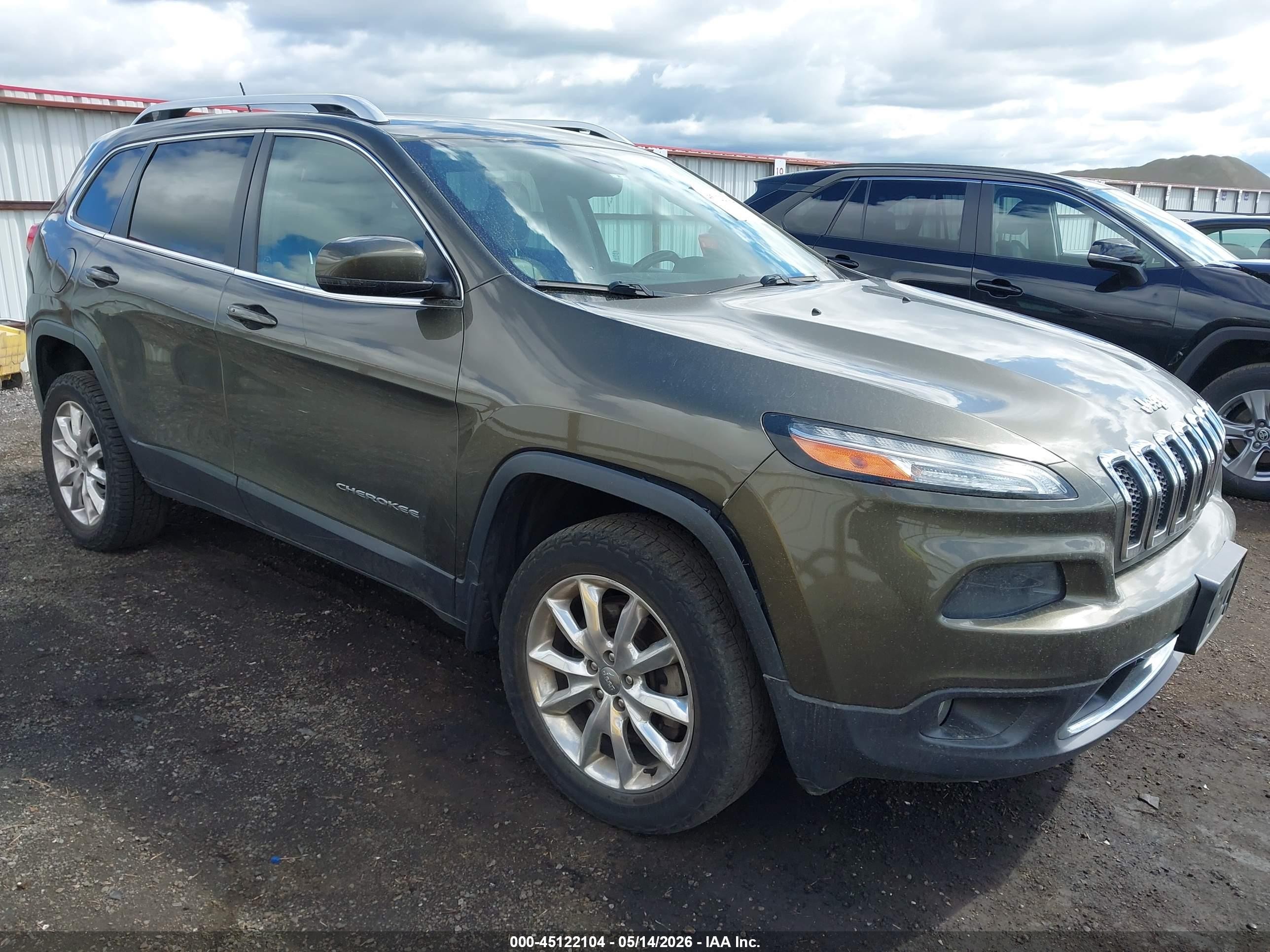 2015 Jeep Cherokee Limited, VIN 1C4PJMDSXFW642410 — Бок