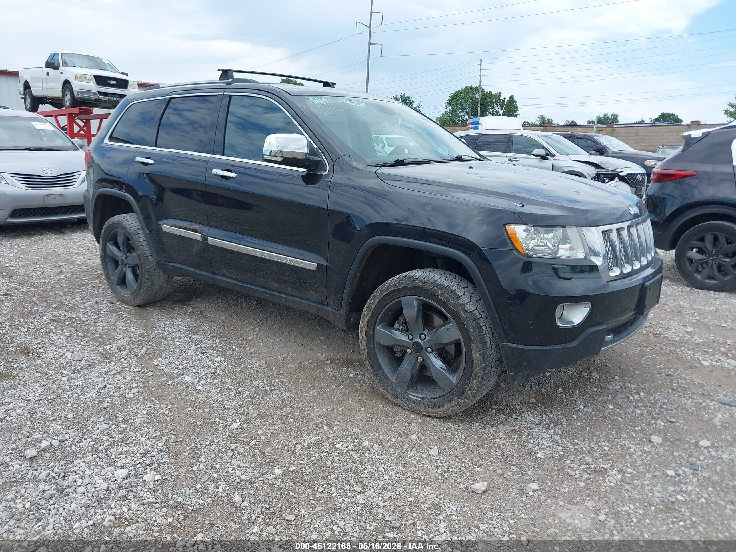 2013 Jeep Grand Cherokee Overland, VIN 1C4RJFCT5DC574899 — Hail