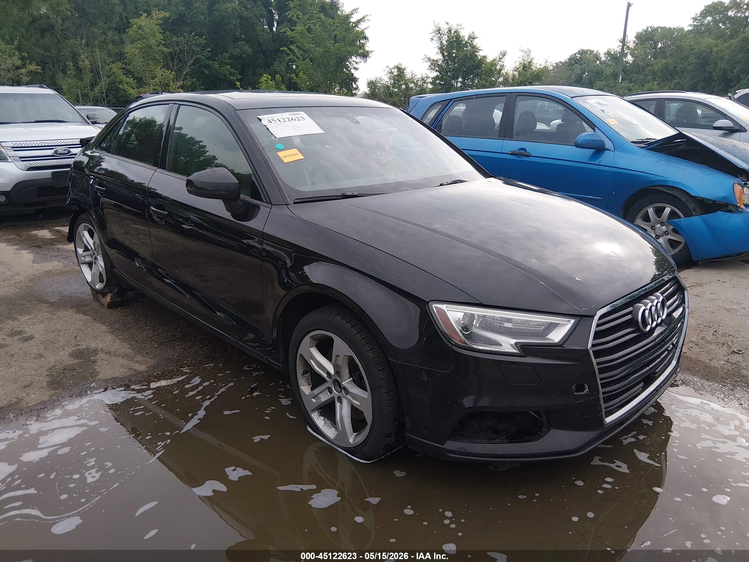 2018 Audi A3 Premium, VIN WAUAUHFF6J1055385 — Rear end