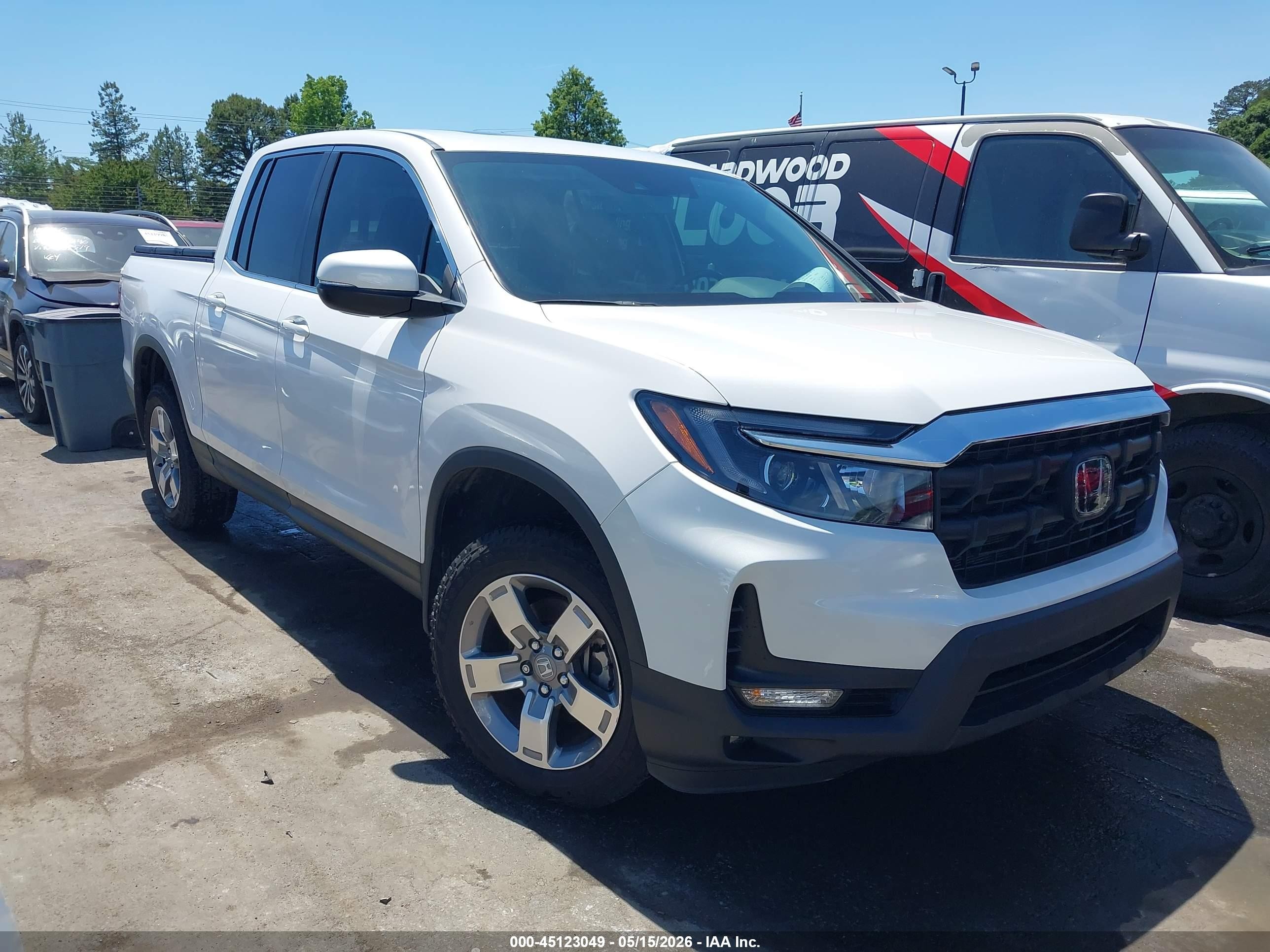 2025 Honda Ridgeline RTL, VIN 5FPYK3F50SB023954 — Side