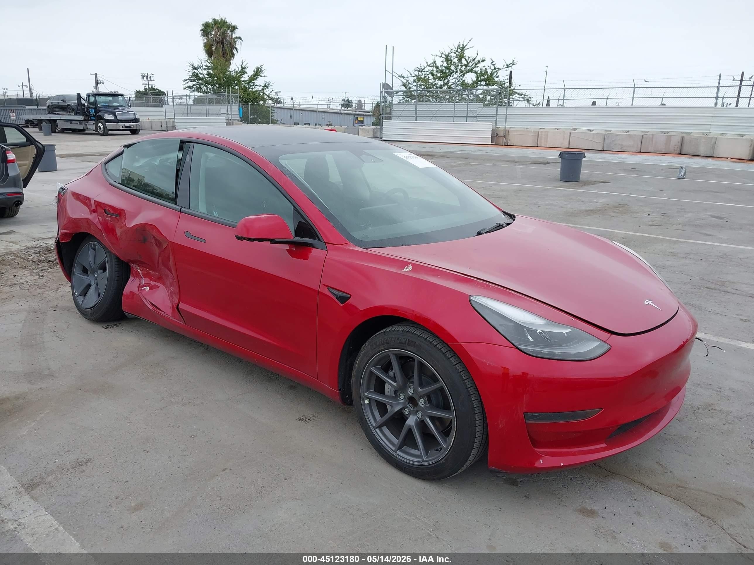 2023 Tesla Model 3, VIN 5YJ3E1EA0PF476220 — Side