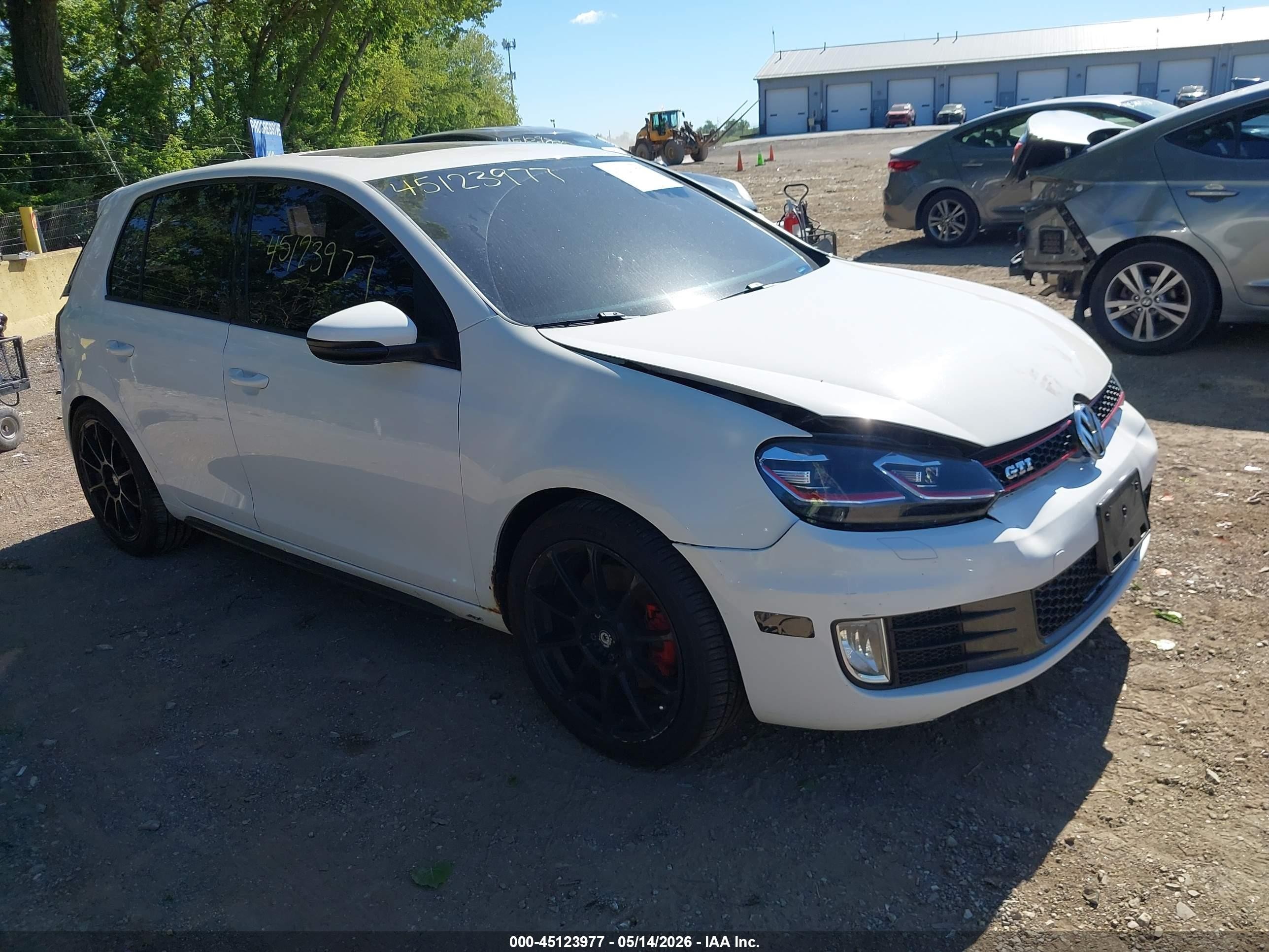 2012 Volkswagen Golf GTI, VIN WVWHV7AJ9CW271404 — Rear end