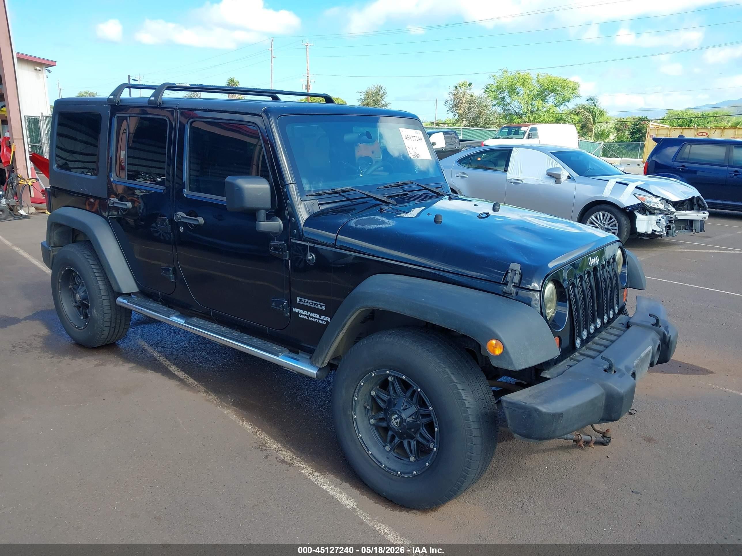 2013 Jeep Wrangler Unlimited Sport, VIN 1C4BJWDG7DL504369 — Undercarriage