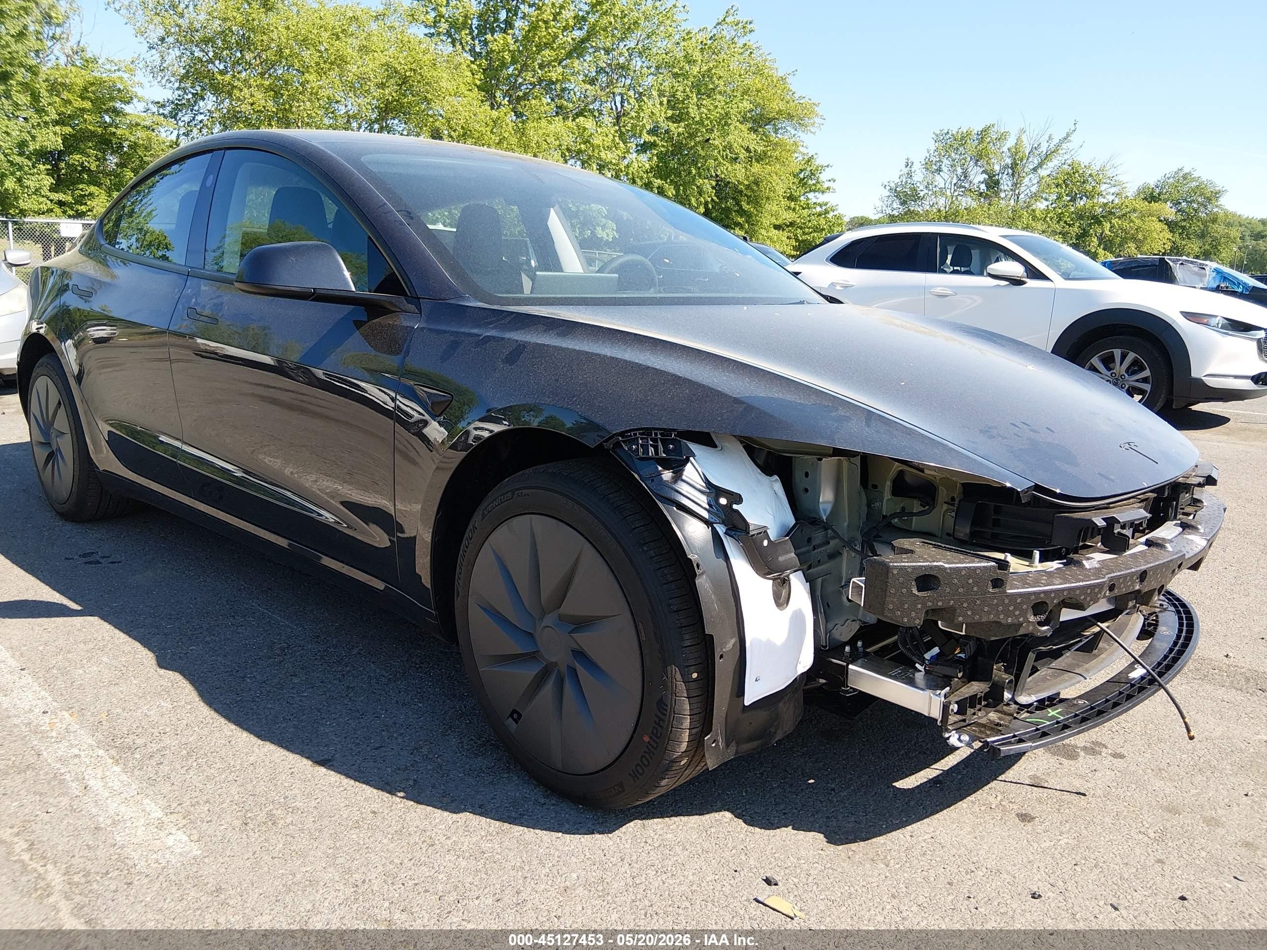 2026 Tesla Model 3 Premium, VIN 5YJ3E1EA7TF176975 — Front end