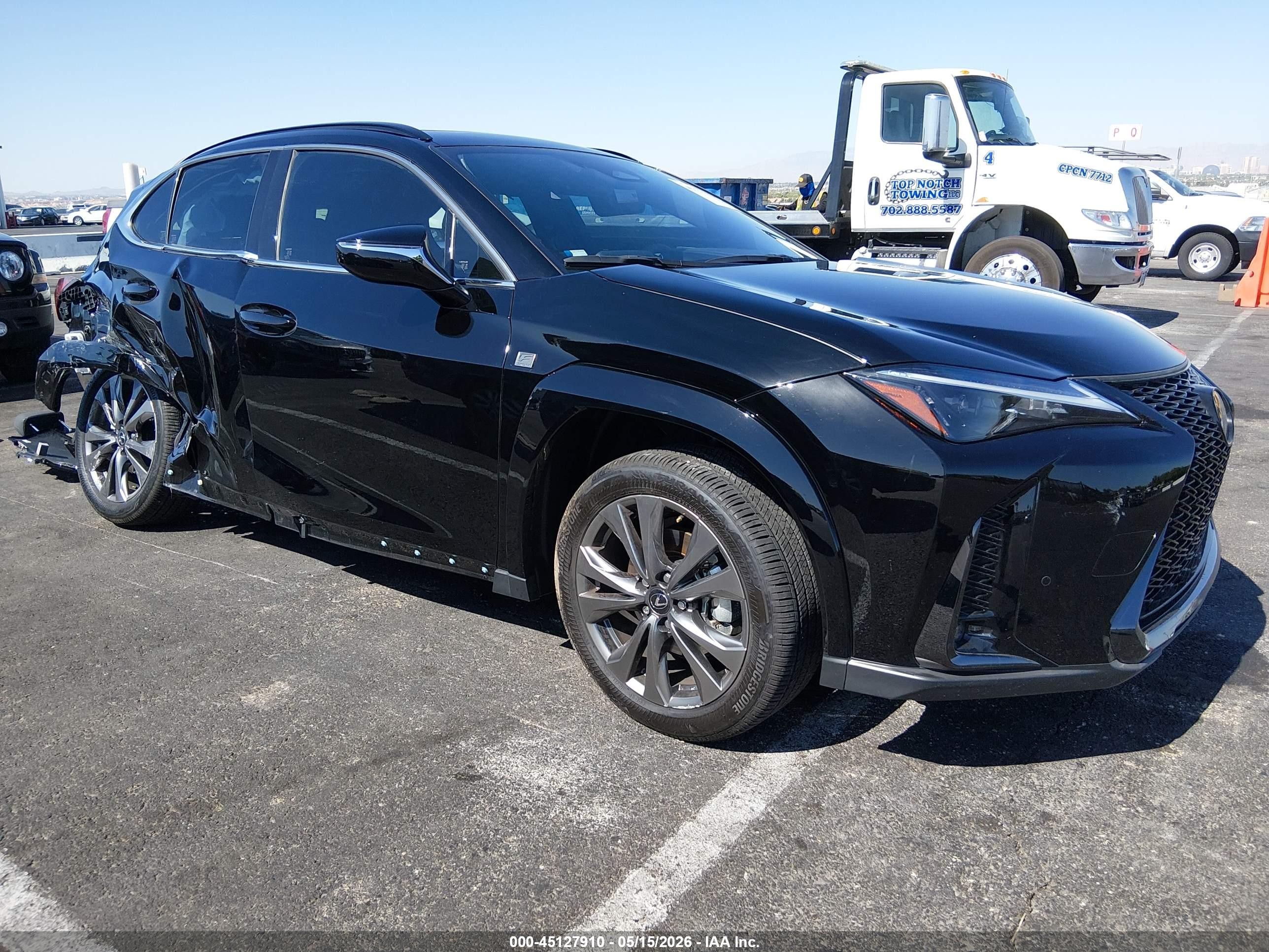 2025 Lexus UX 300h, VIN JTHYBJAH0S2002781 — Rear end
