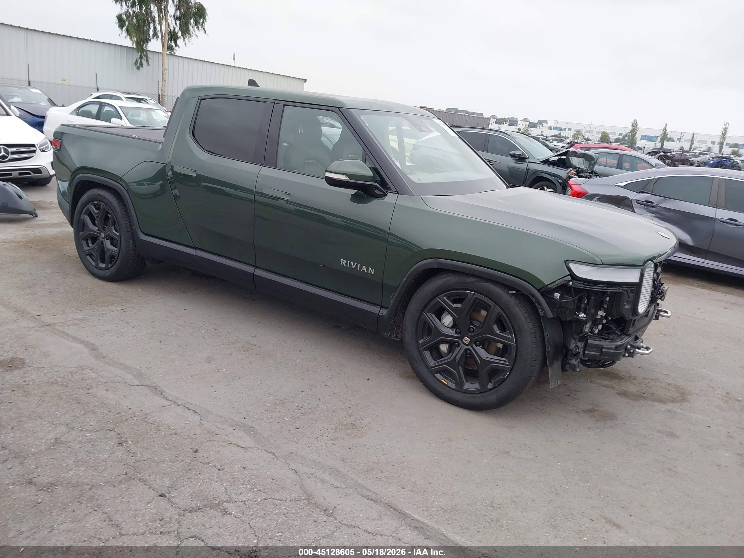 2023 Rivian R1T Adventure, VIN 7FCTGBAA2PN028191 — Side