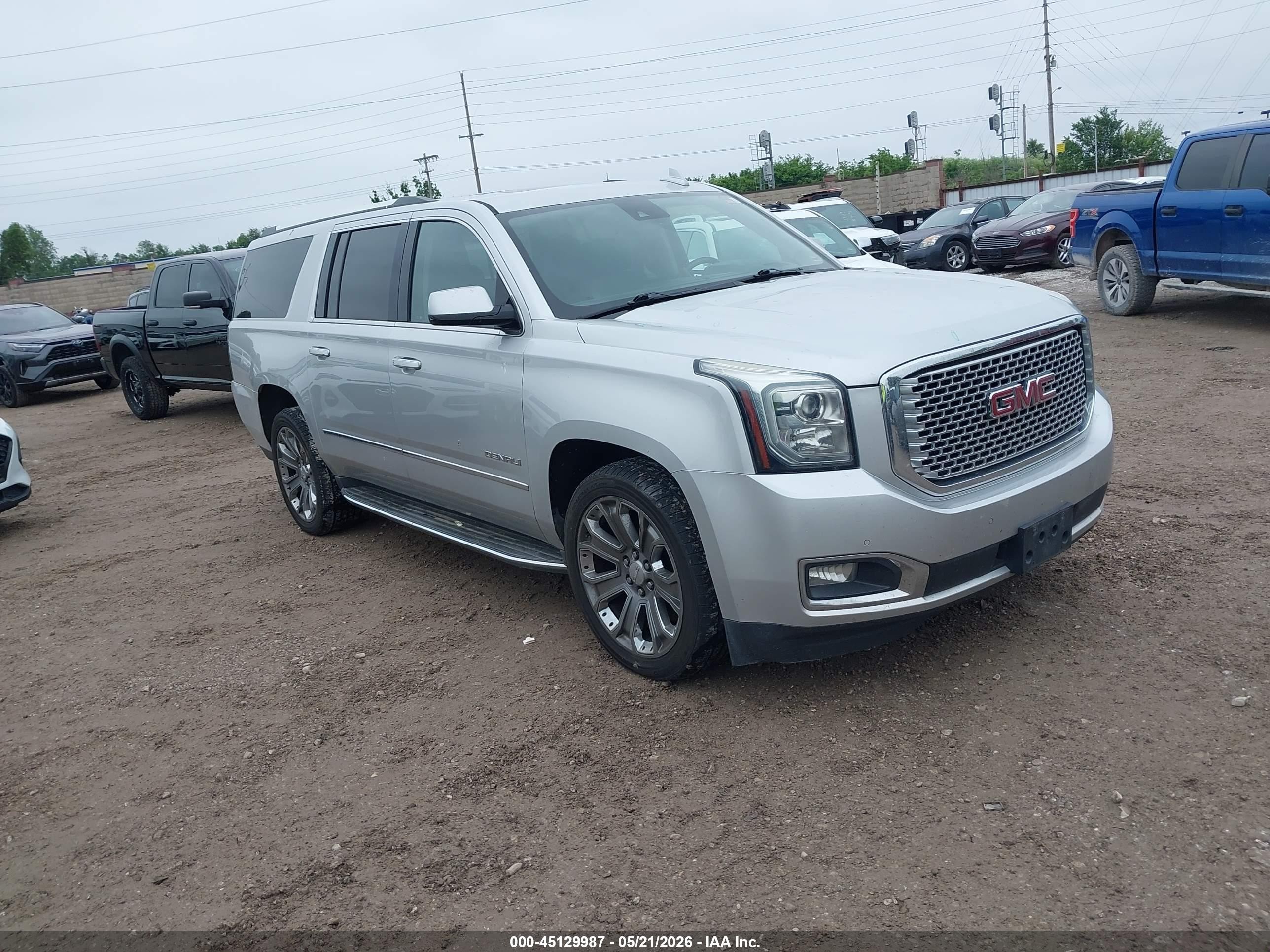 2016 GMC Yukon XL Denali, VIN 1GKS2HKJ8GR193127 — Hail