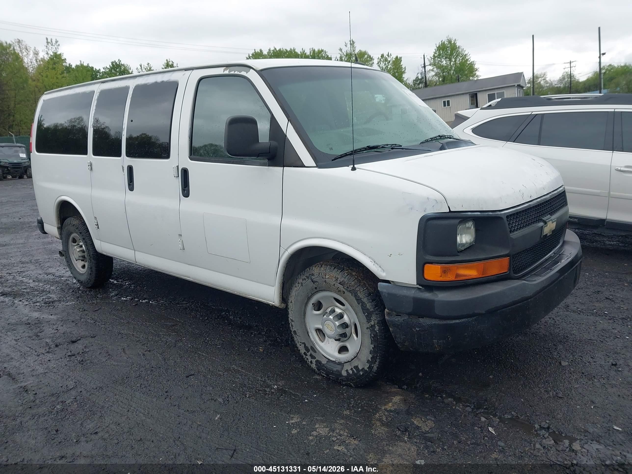 2012 Chevrolet Express Passenger 1LS, VIN 1GAWGPFA9C1102726 — Normal wear