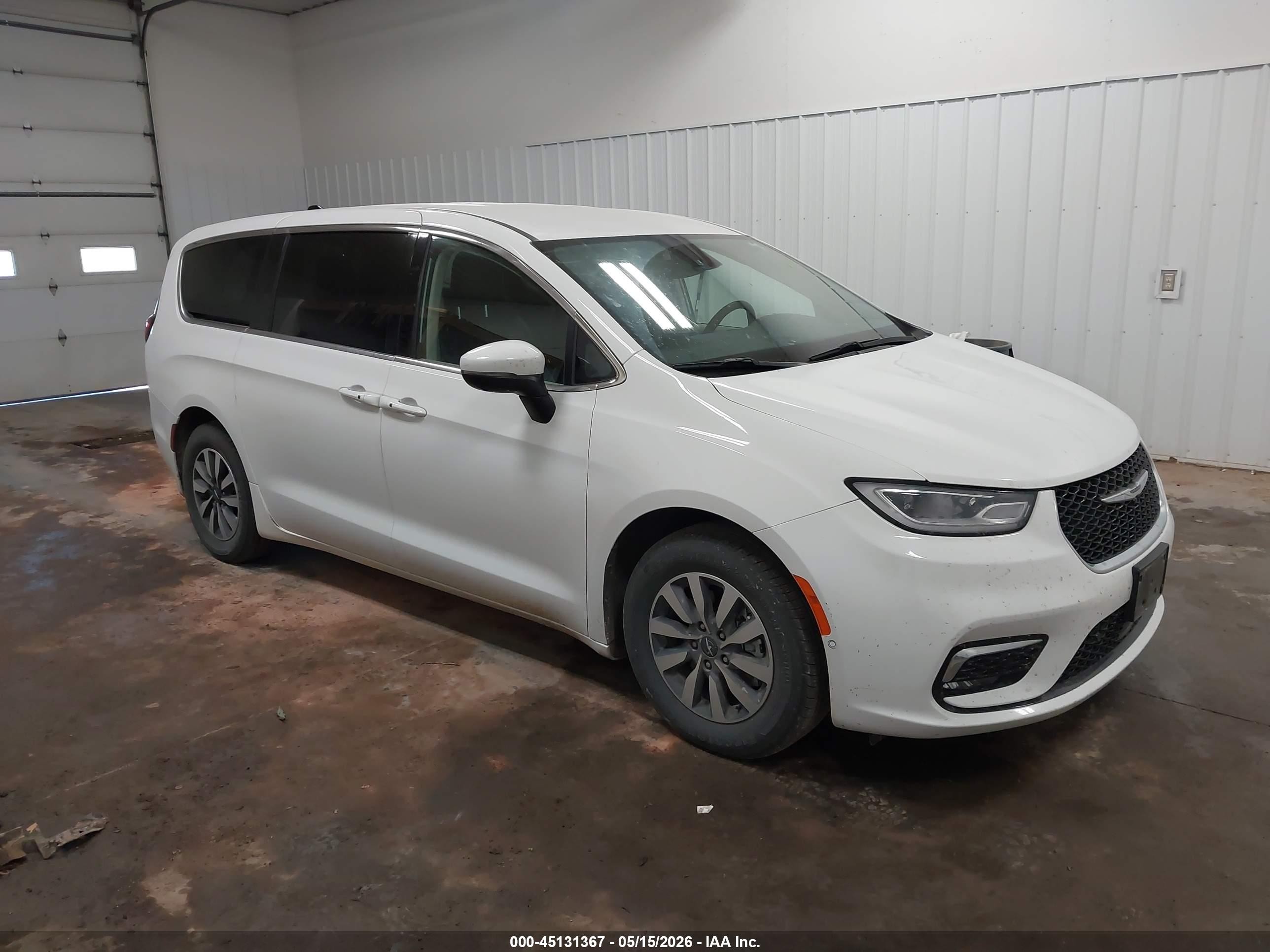 2023 Chrysler Pacifica Hybrid Touring L, VIN 2C4RC1L77PR558876 — Обычный износ